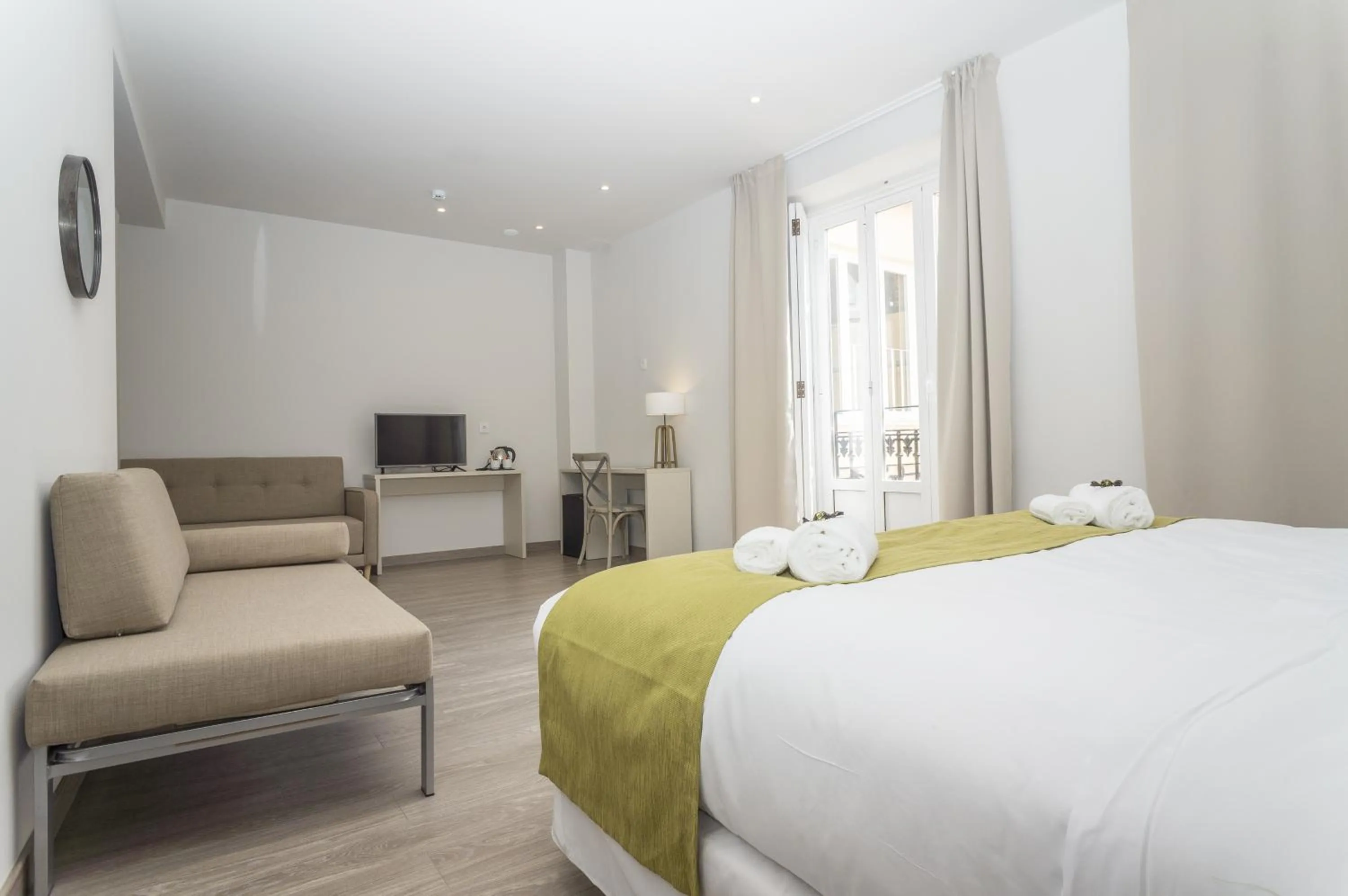 Bed in Hotel San Lorenzo Boutique Plaza