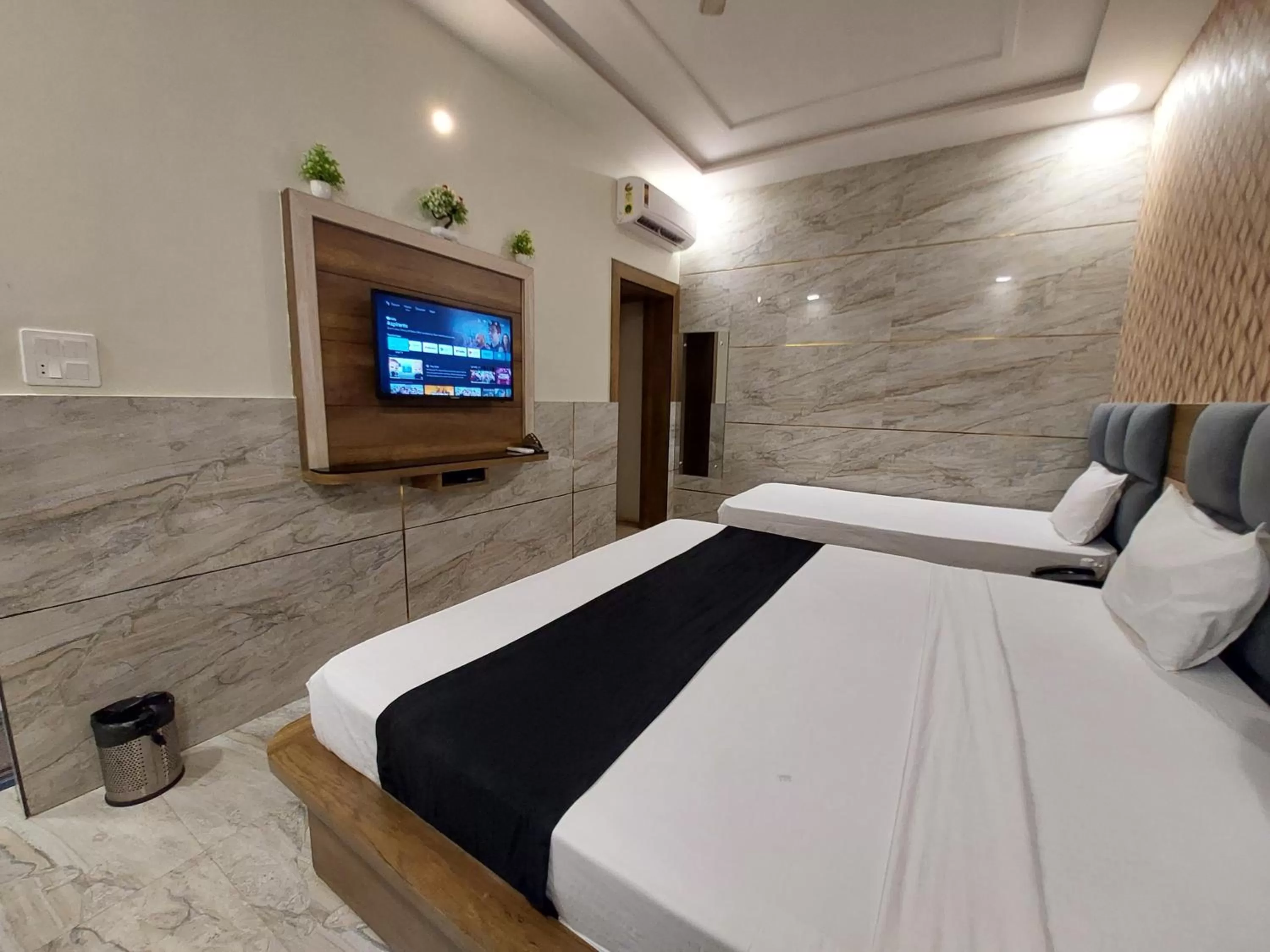 Bed in Taj Nice Point Manage by Taj Sunrise Group