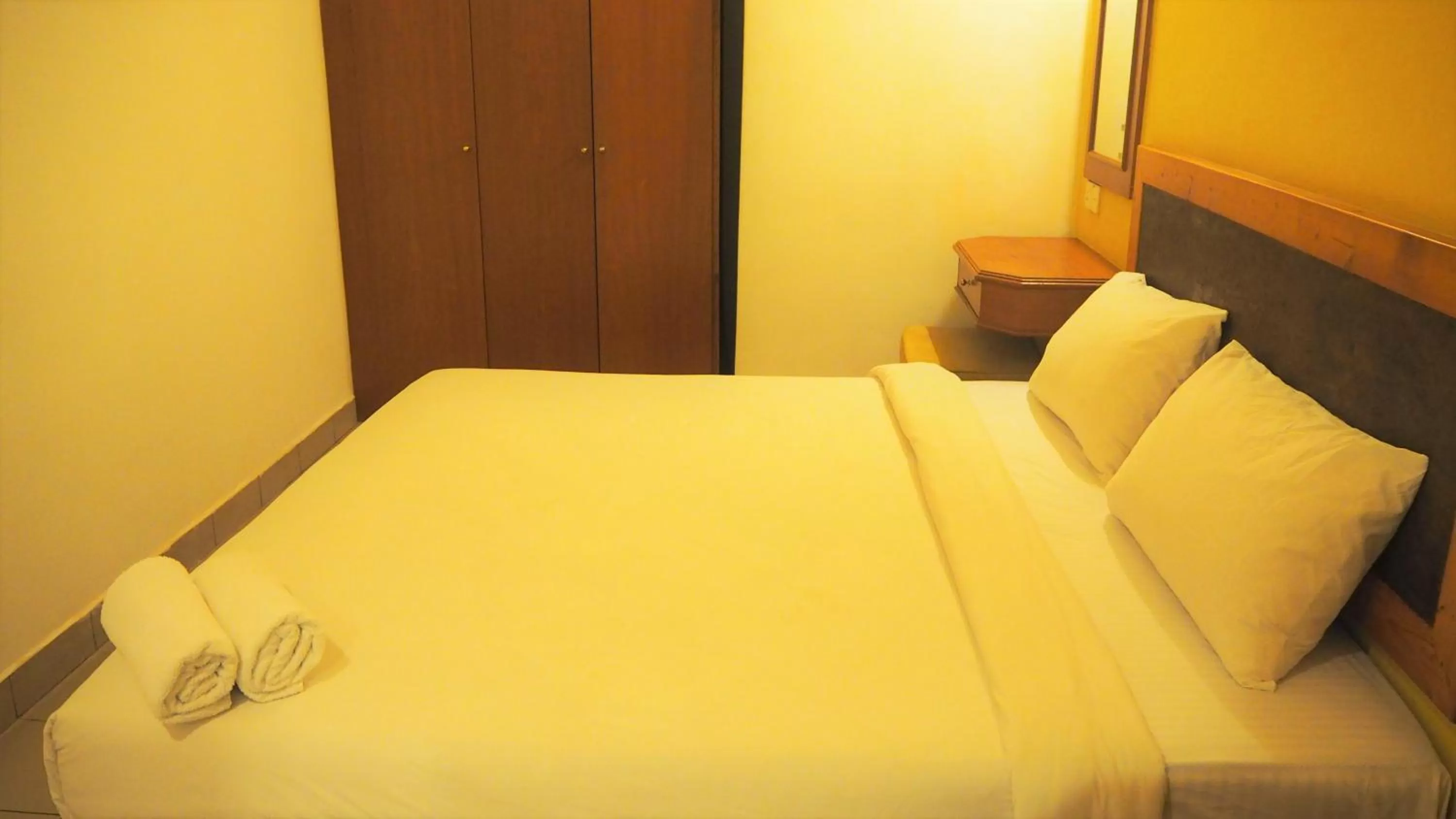 Bed in Leo Palace Hotel Classic Wing, WTC Kuala Lumpur