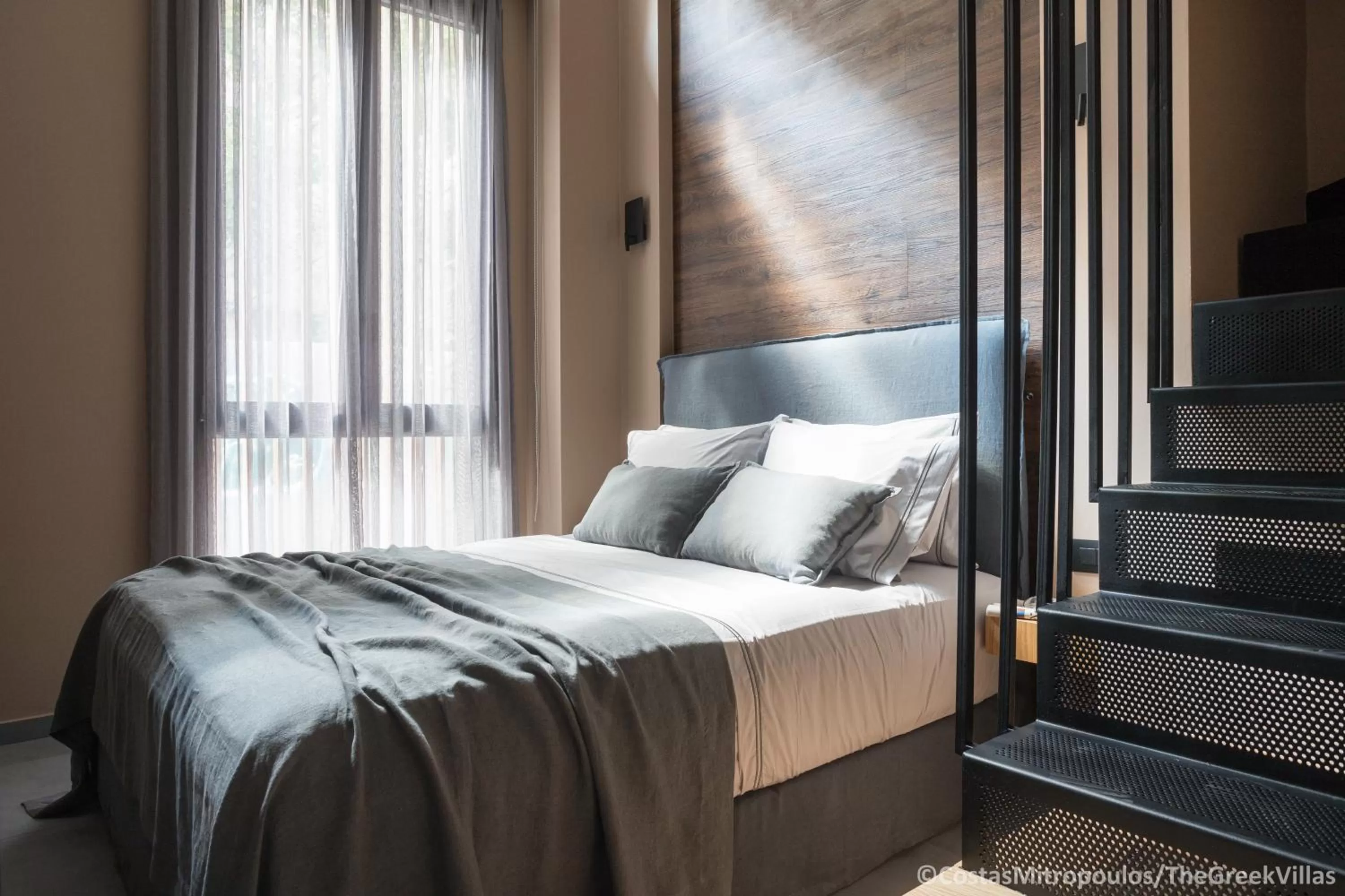 Quiet street view, Bed in 11 Enteka Acropolis Suites