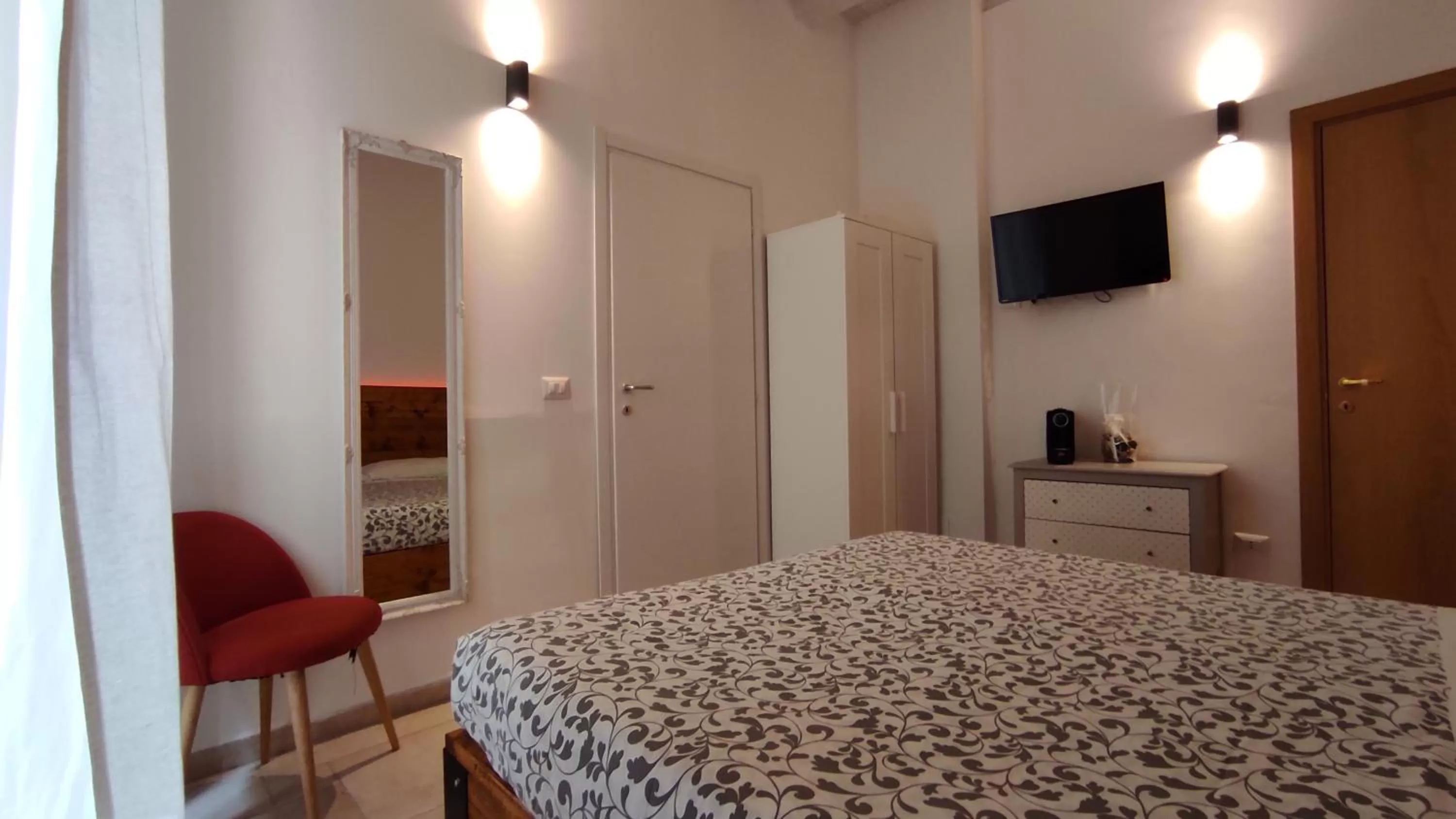 Photo of the whole room in ''B&B Santa Rita Corato fitta camere''