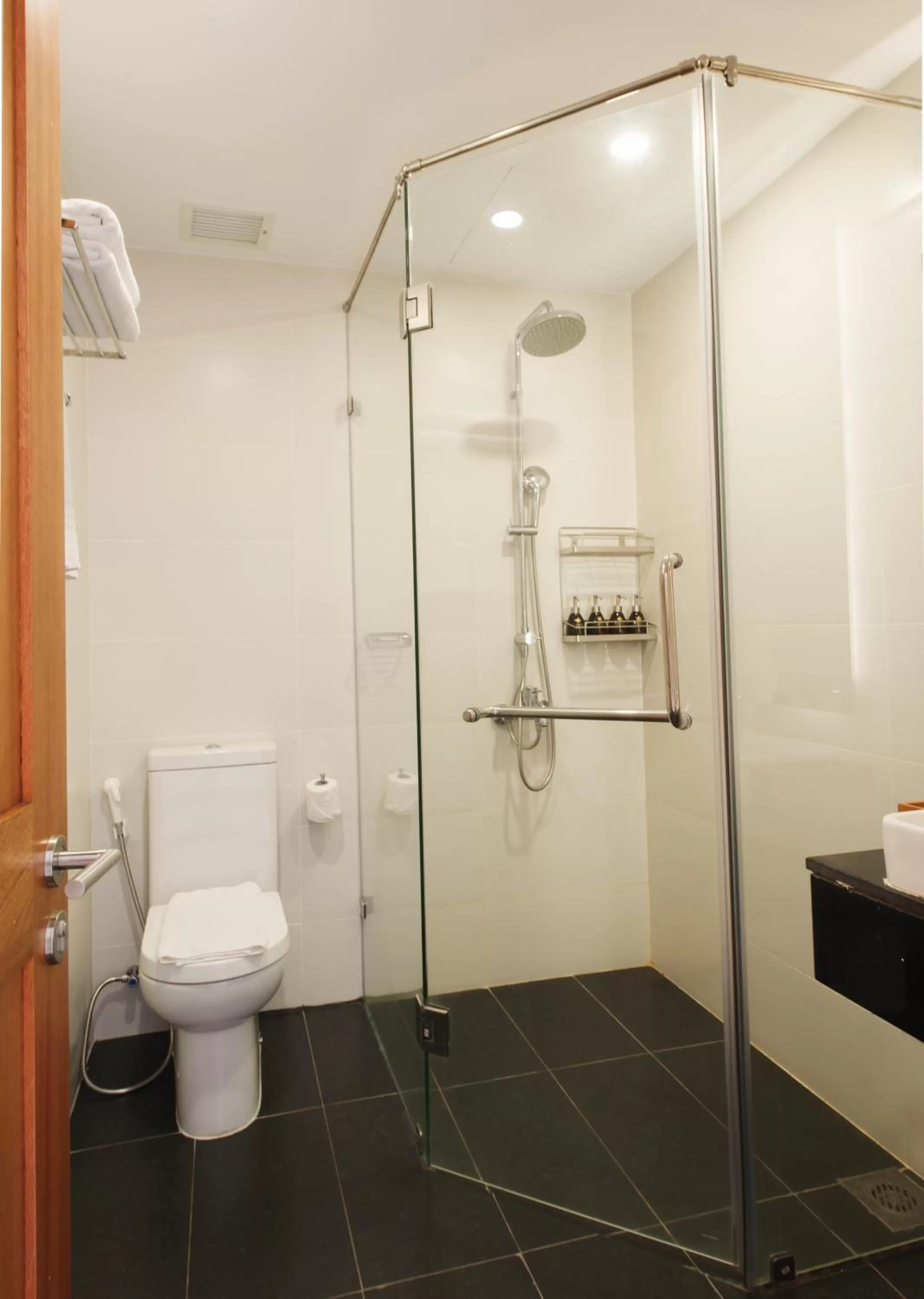 Shower in Maple Hotel & Apartment