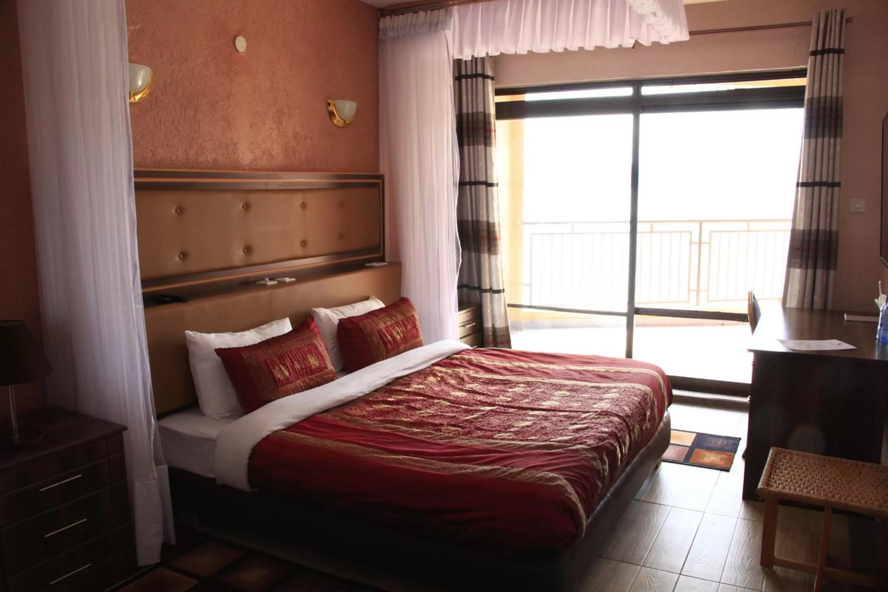 Bedroom, Bed in Milimani Beach Resort