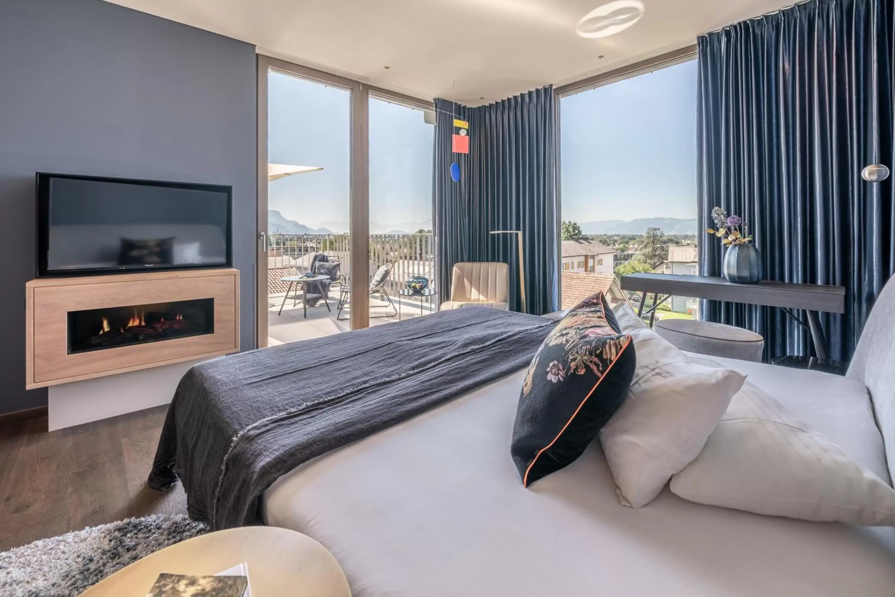 Design Lounge Panorama with Balcony and Fireplace in hirschen dornbirn - das boutiquestyle hotel - skyrelax & wellness im rooftop Design Lounge Panorama with Balcony and Fireplace in hirschen dornbirn - das boutiquestyle hotel - skyrelax & wellness im rooftop