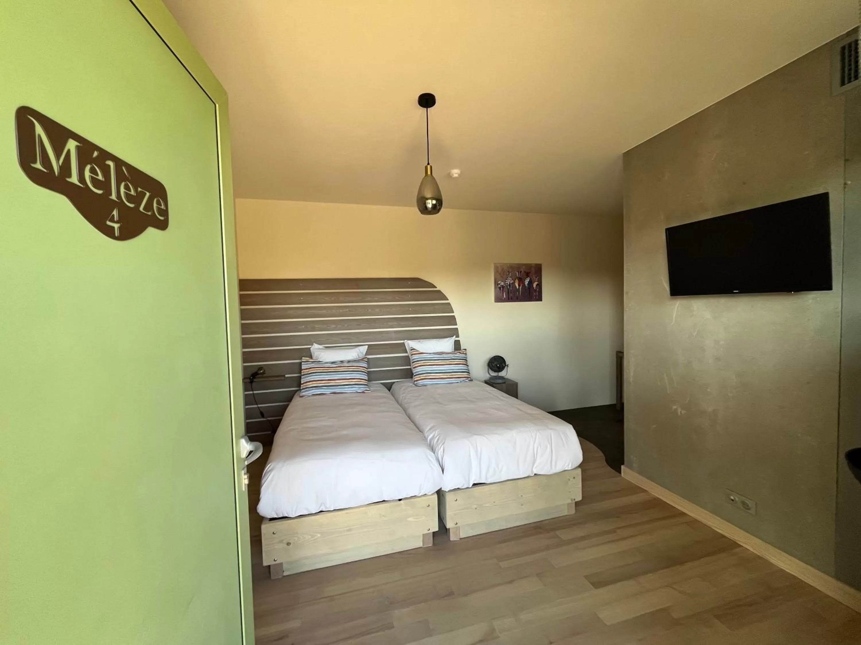 Bed in Hôtel En Tilleul