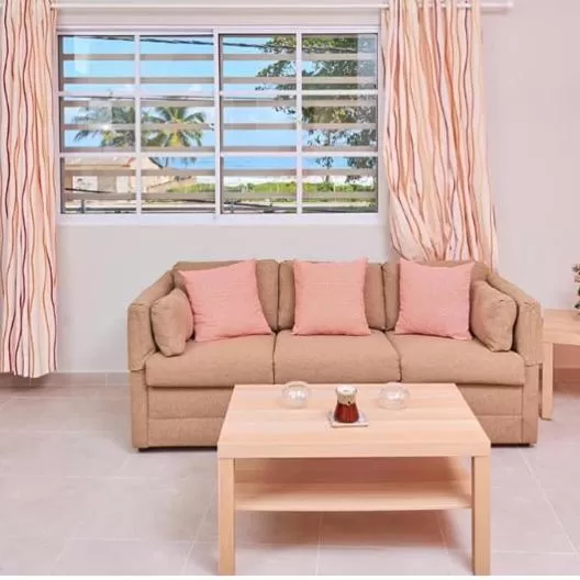 Living room, Seating Area in Apartahotel MACADANA