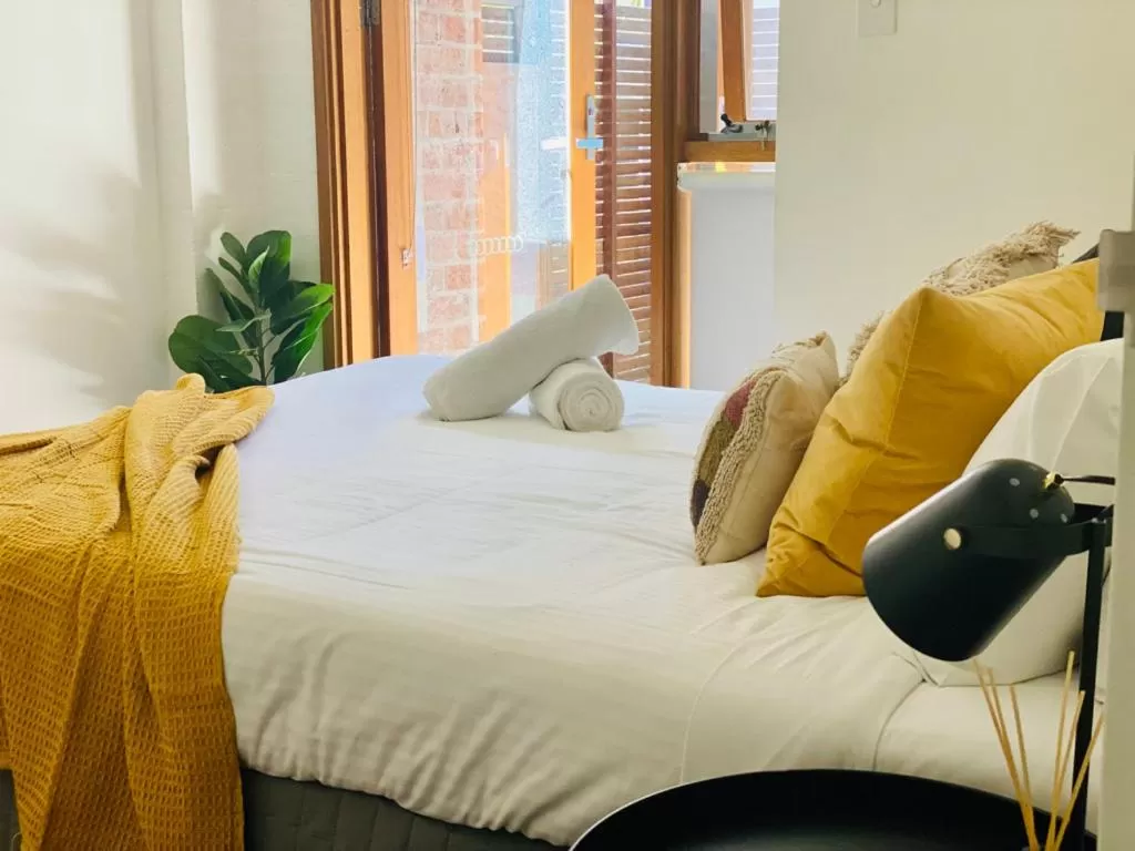 Bedroom, Bed in Byron Butter Factory Apartments