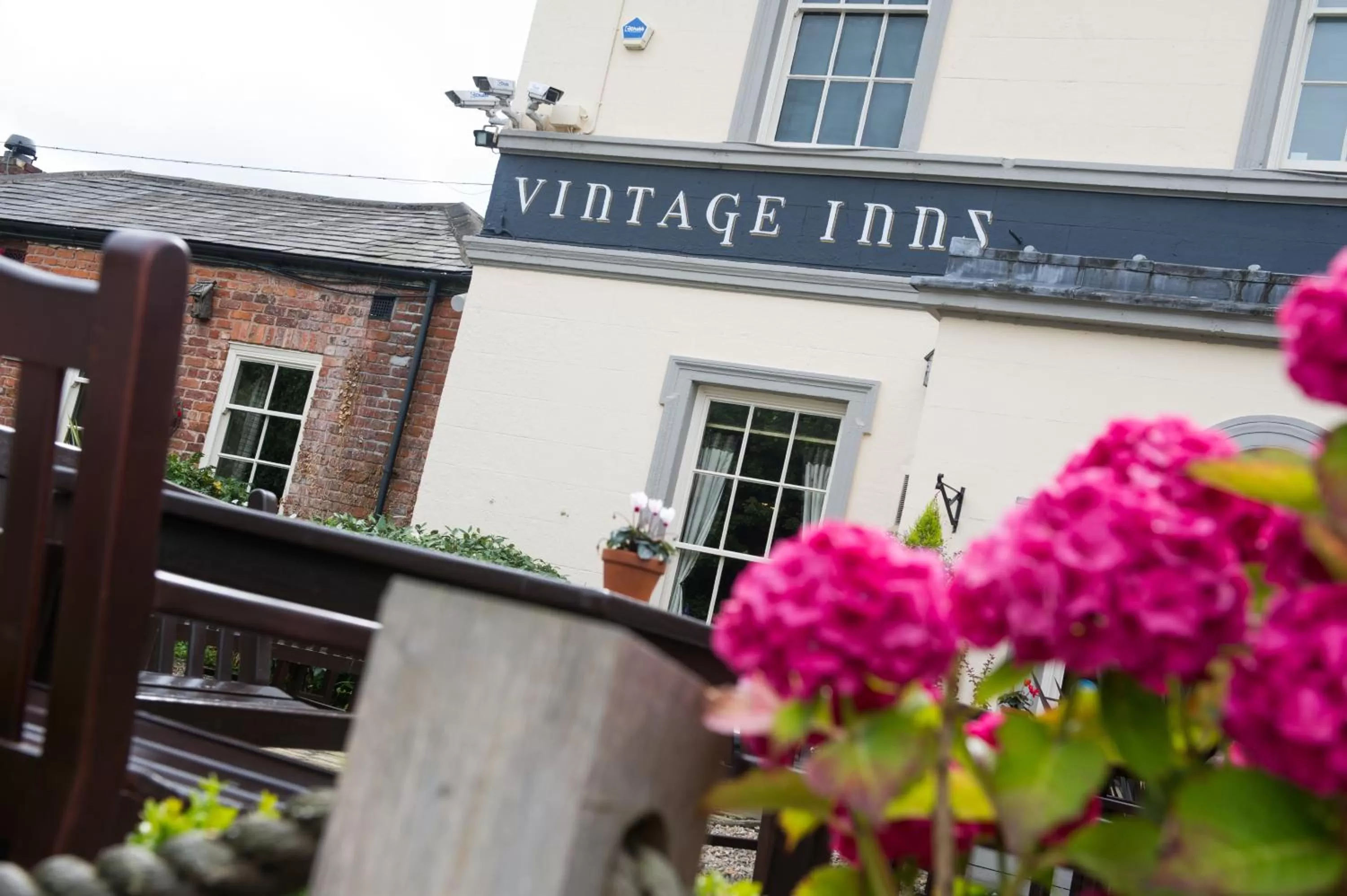 Property logo or sign in The Cheshire Cat by Innkeeper's Collection