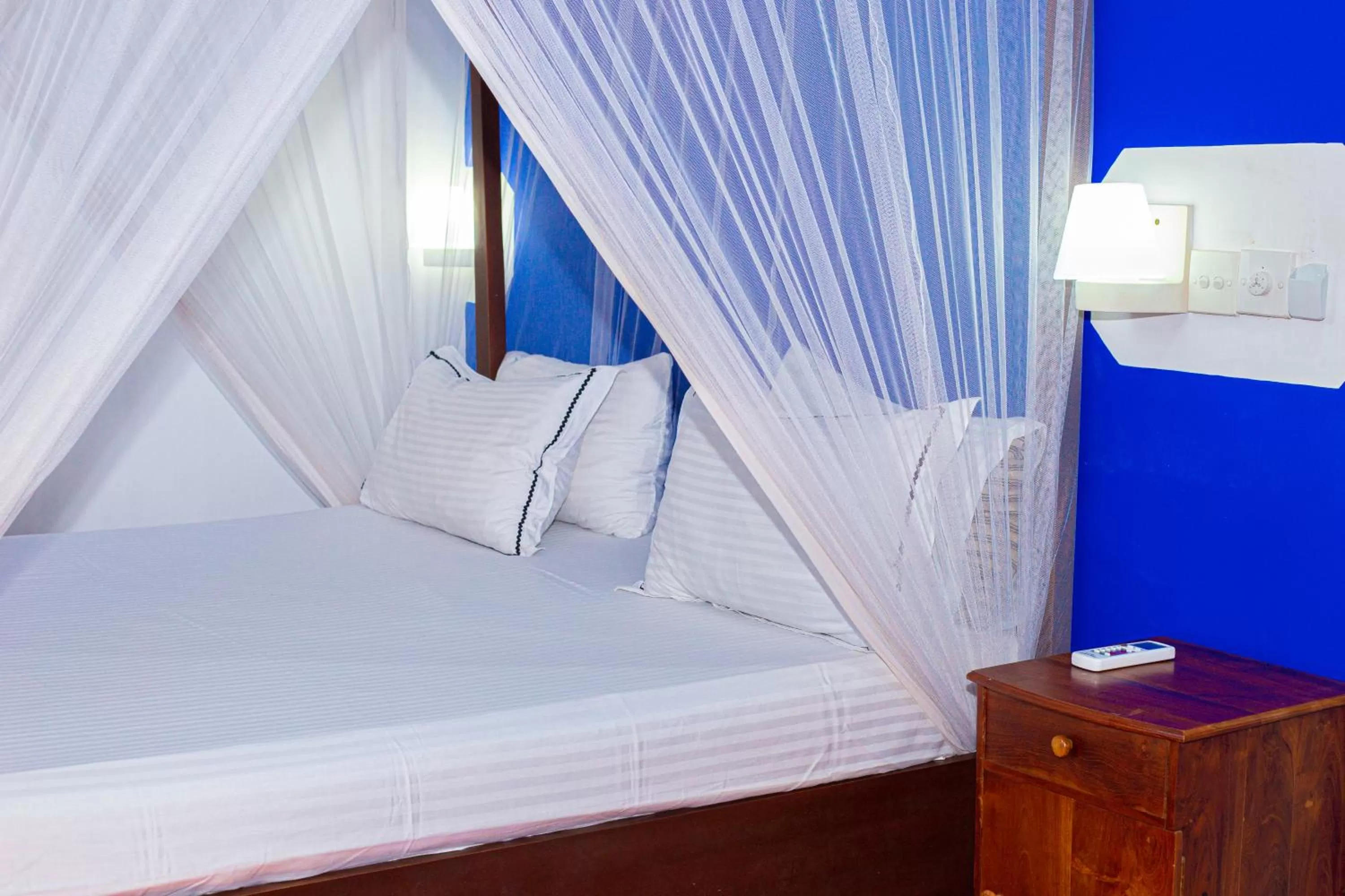 Bed in Surasa Beach Resort