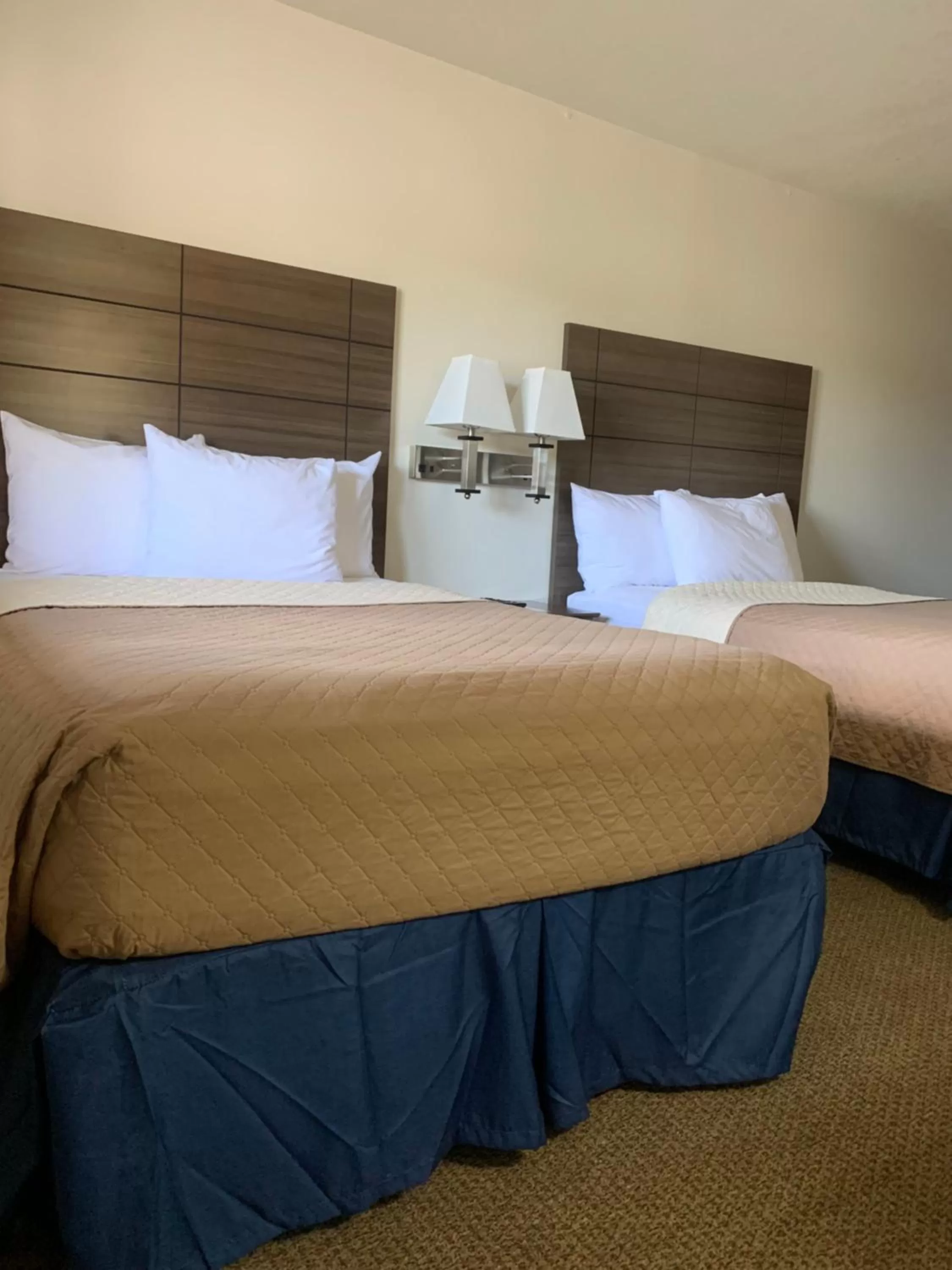 Bed in Lakes Area Inn