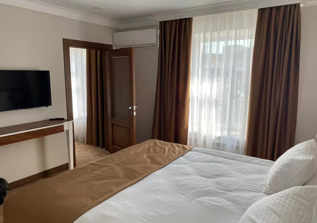 Bed in Boutique Hotel Kaspi