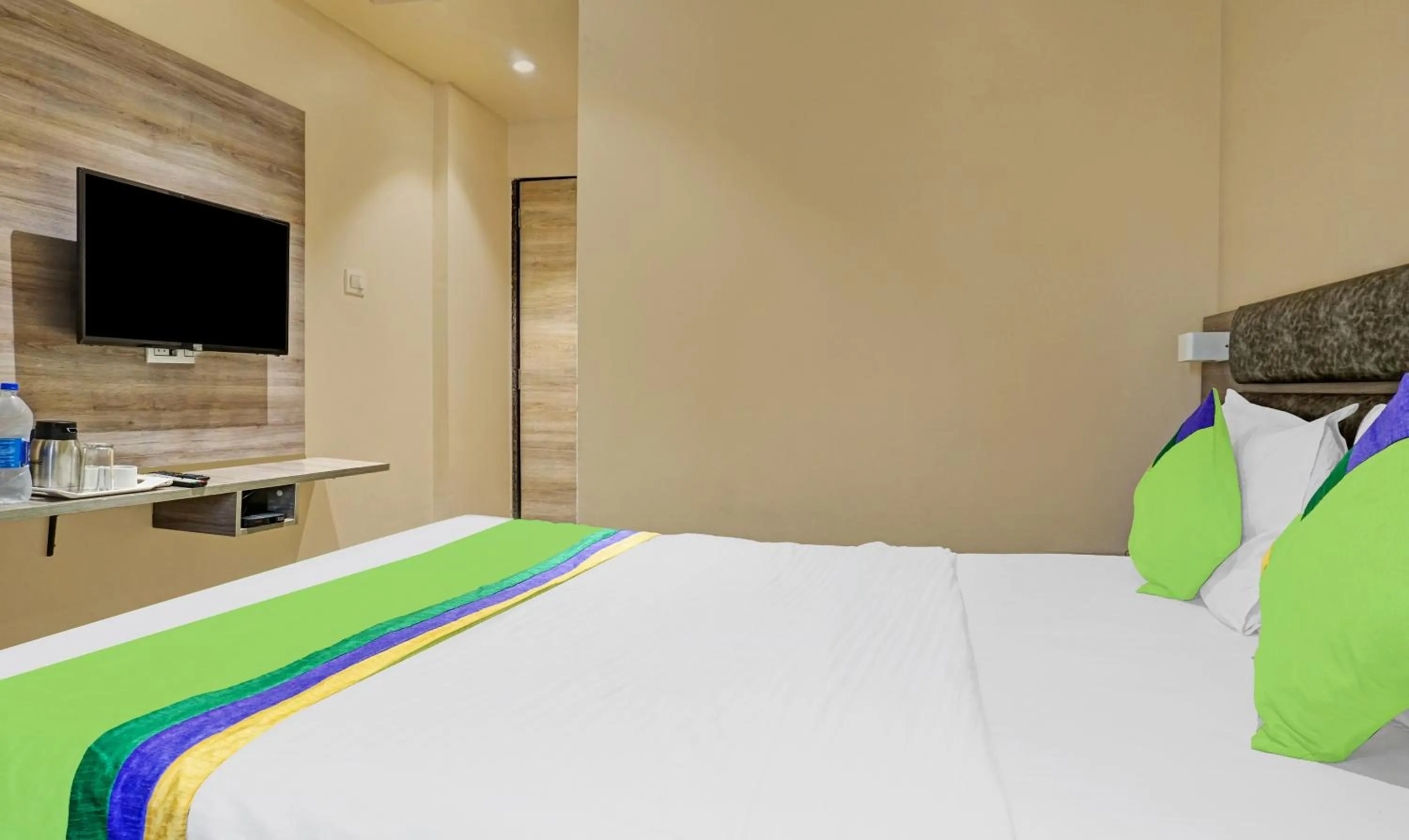 Bedroom, Bed in Treebo Classic Grande, Camp