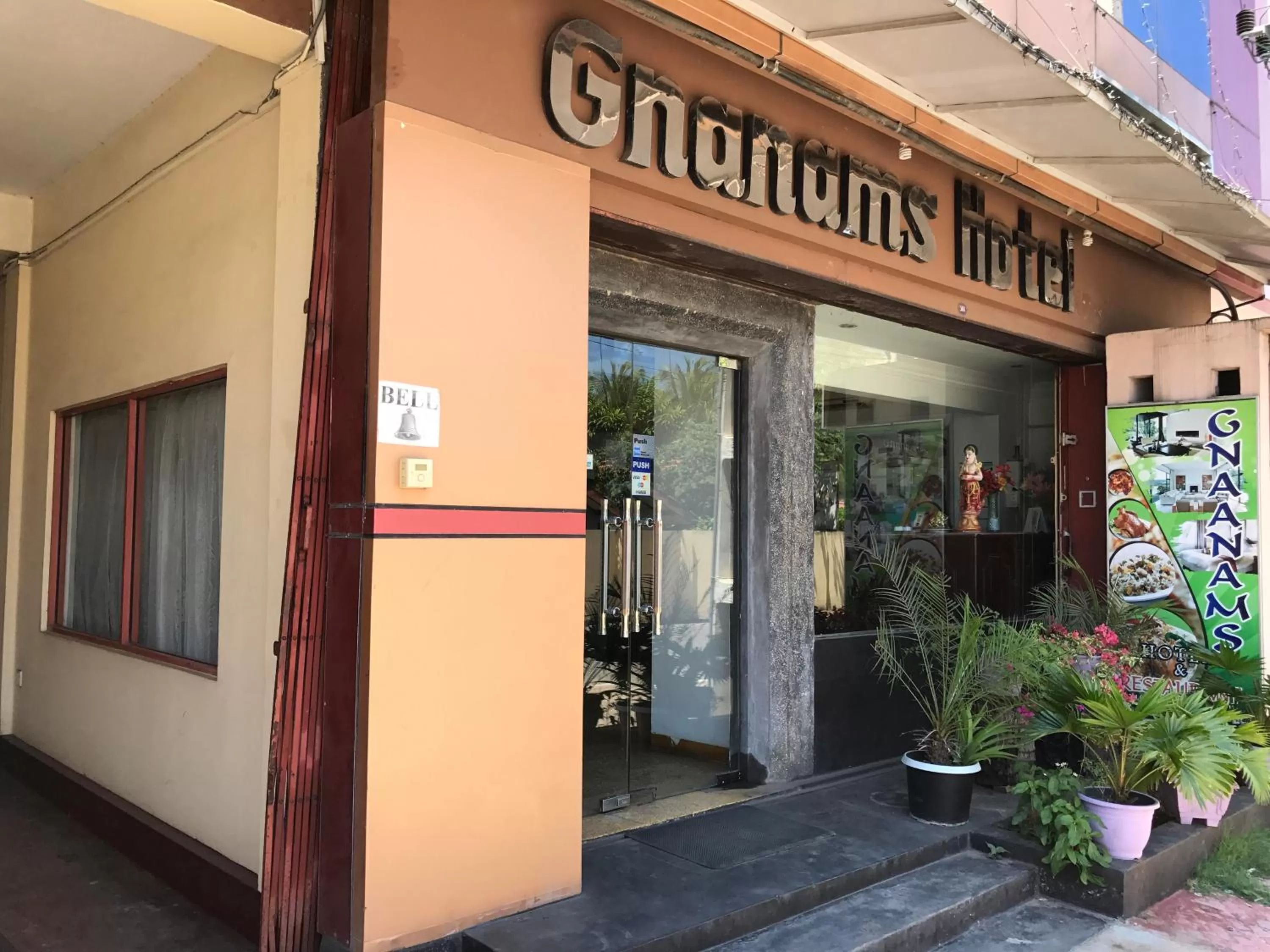 Property logo or sign in Gnaanams Hotel and Restaurant