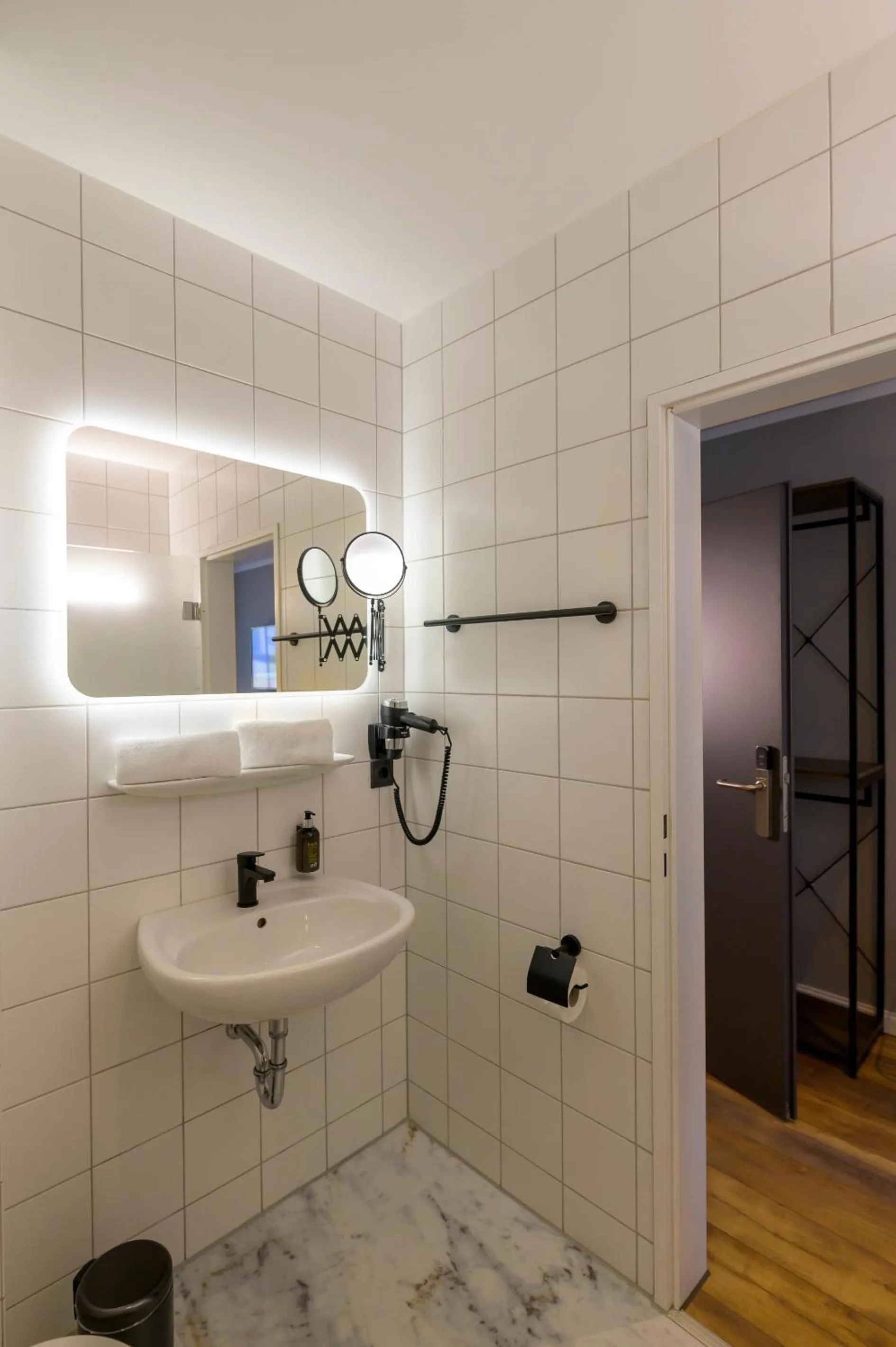 Bathroom in Nikii City Hotel