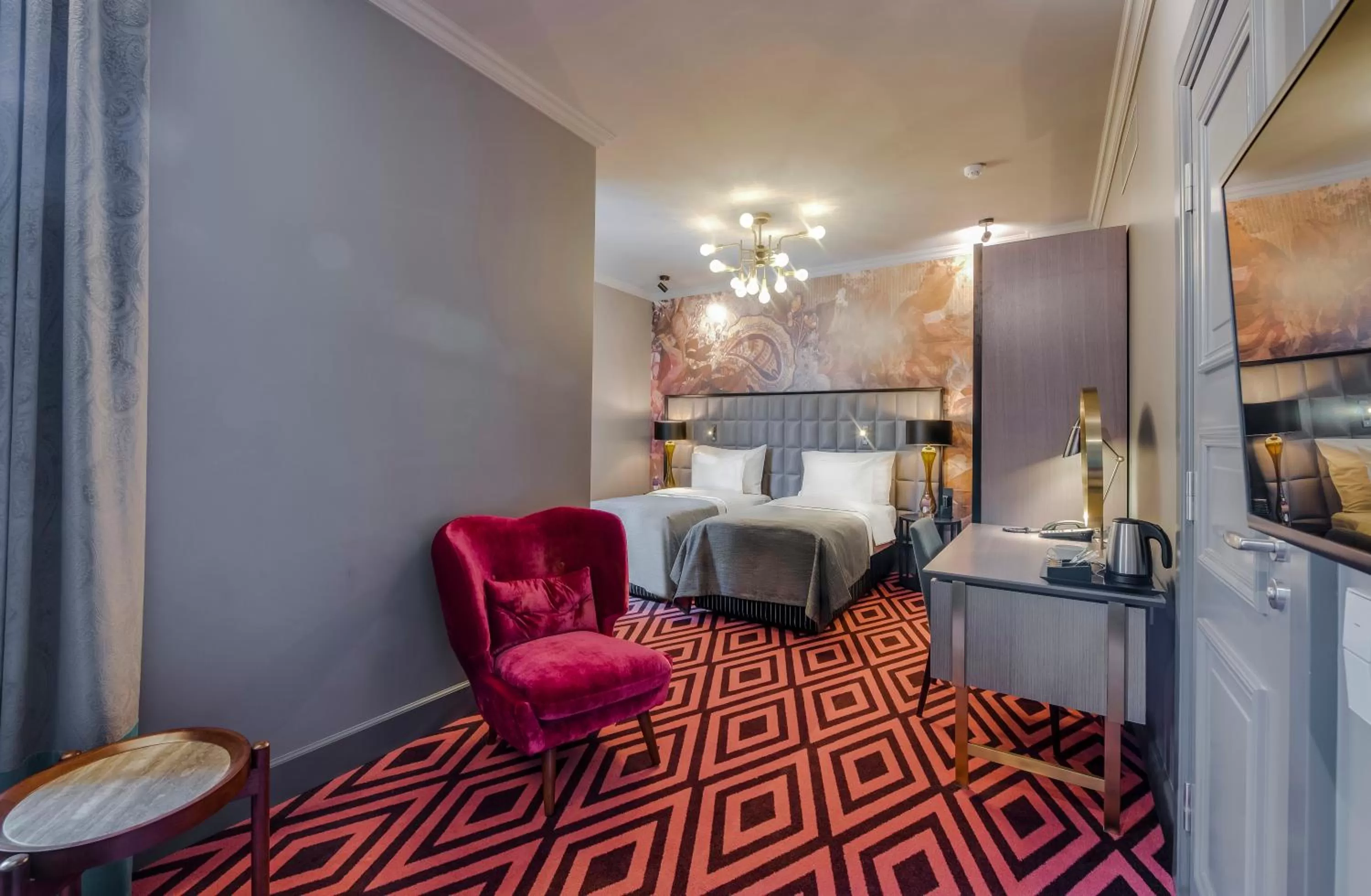 Seating area, Bed in Grand Poet Hotel and SPA by Semarah