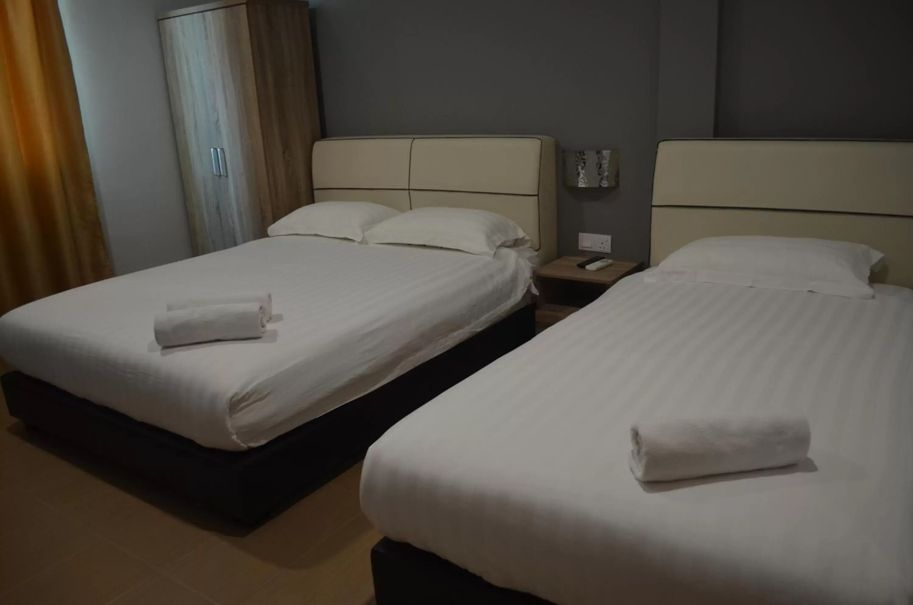 Deluxe Quadruple Room in Welcome Inn GM Deluxe Quadruple Room in Welcome Inn GM