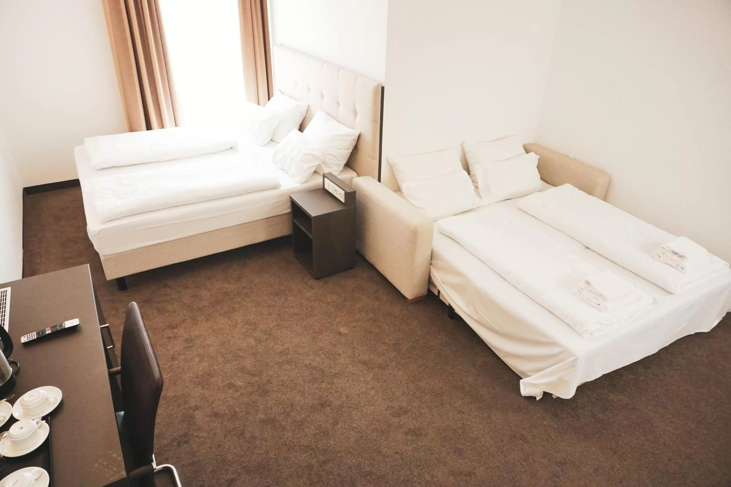 Bed in The Monument Hotel - BW Signature Collection