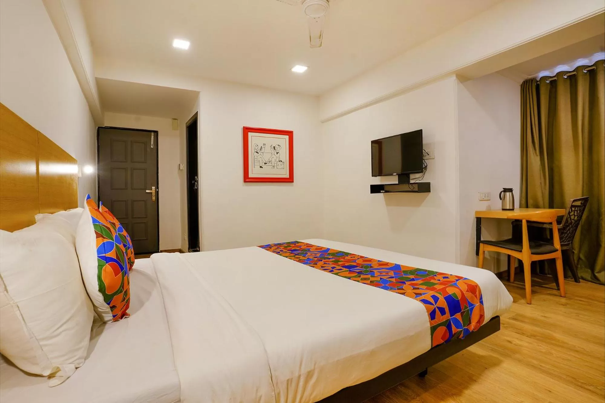 Communal lounge/ TV room, Bed in FabExpress Highway Residency