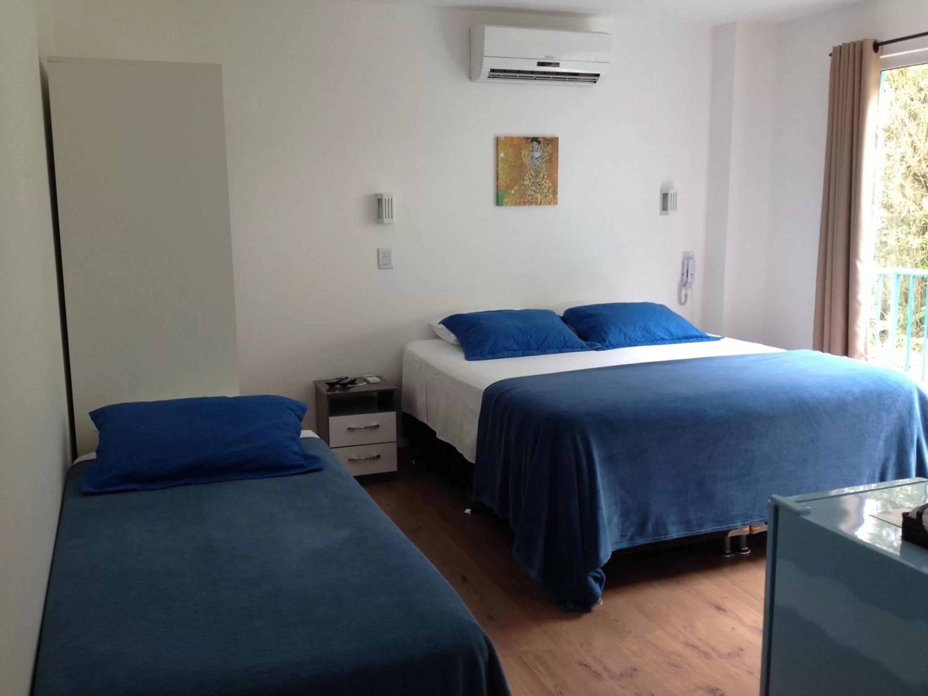 Bed in The Hyperion Boutique Hotel