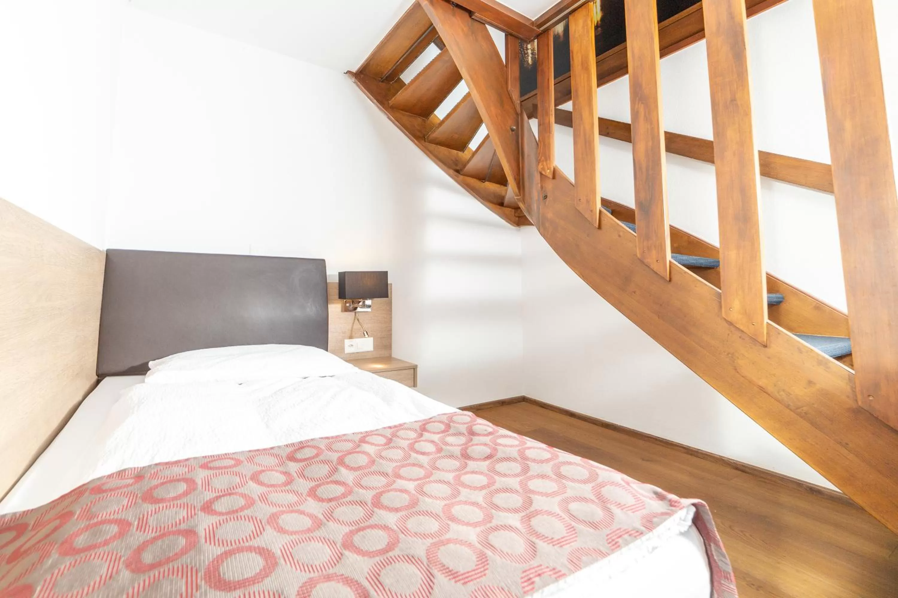 Bed in Hotel Alexander