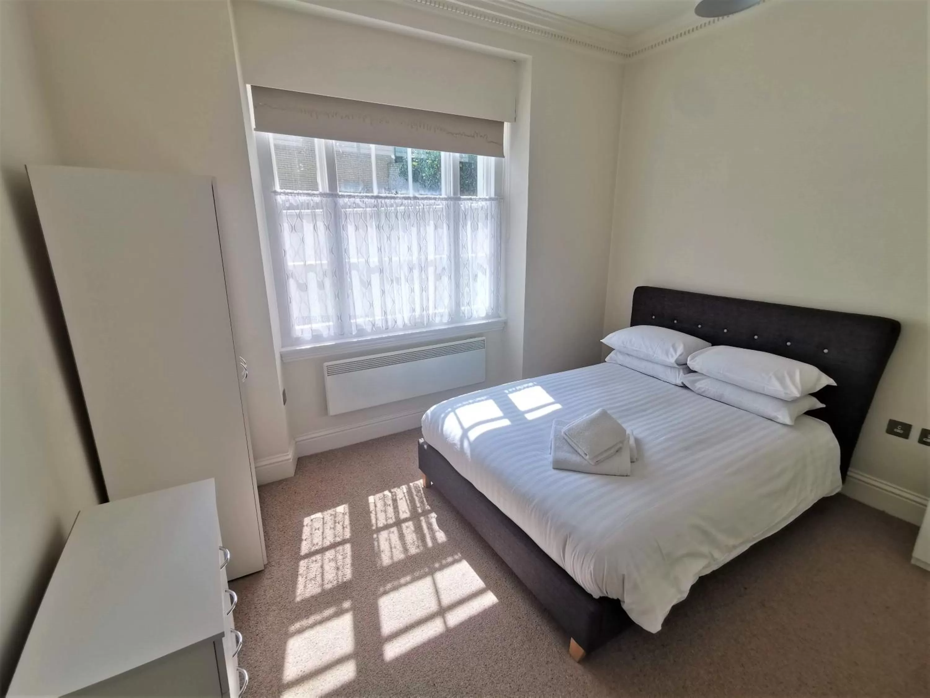 Bed in The Clarendon Royal Community