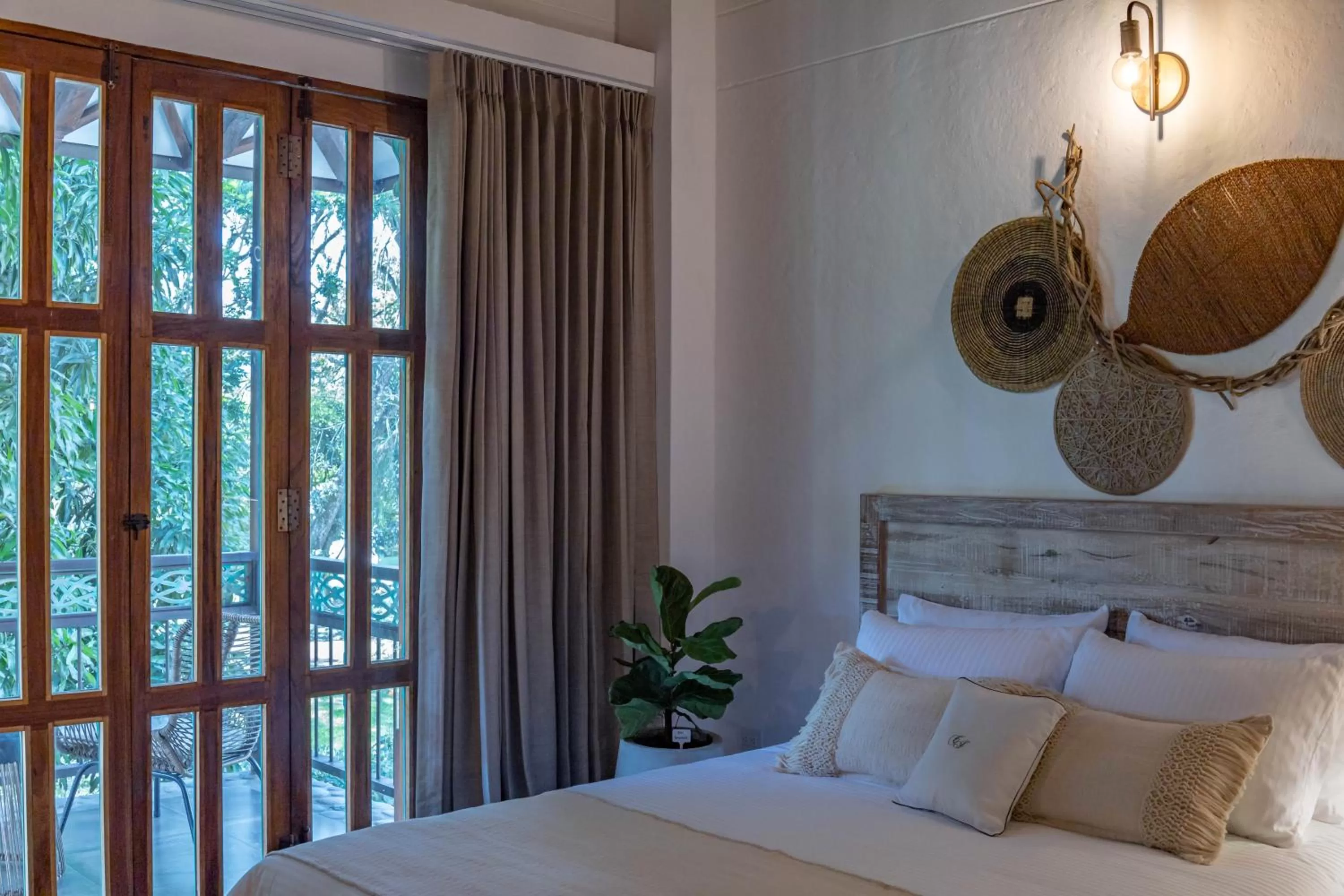 Bed in Casa Jacaranda Hotel Boutique