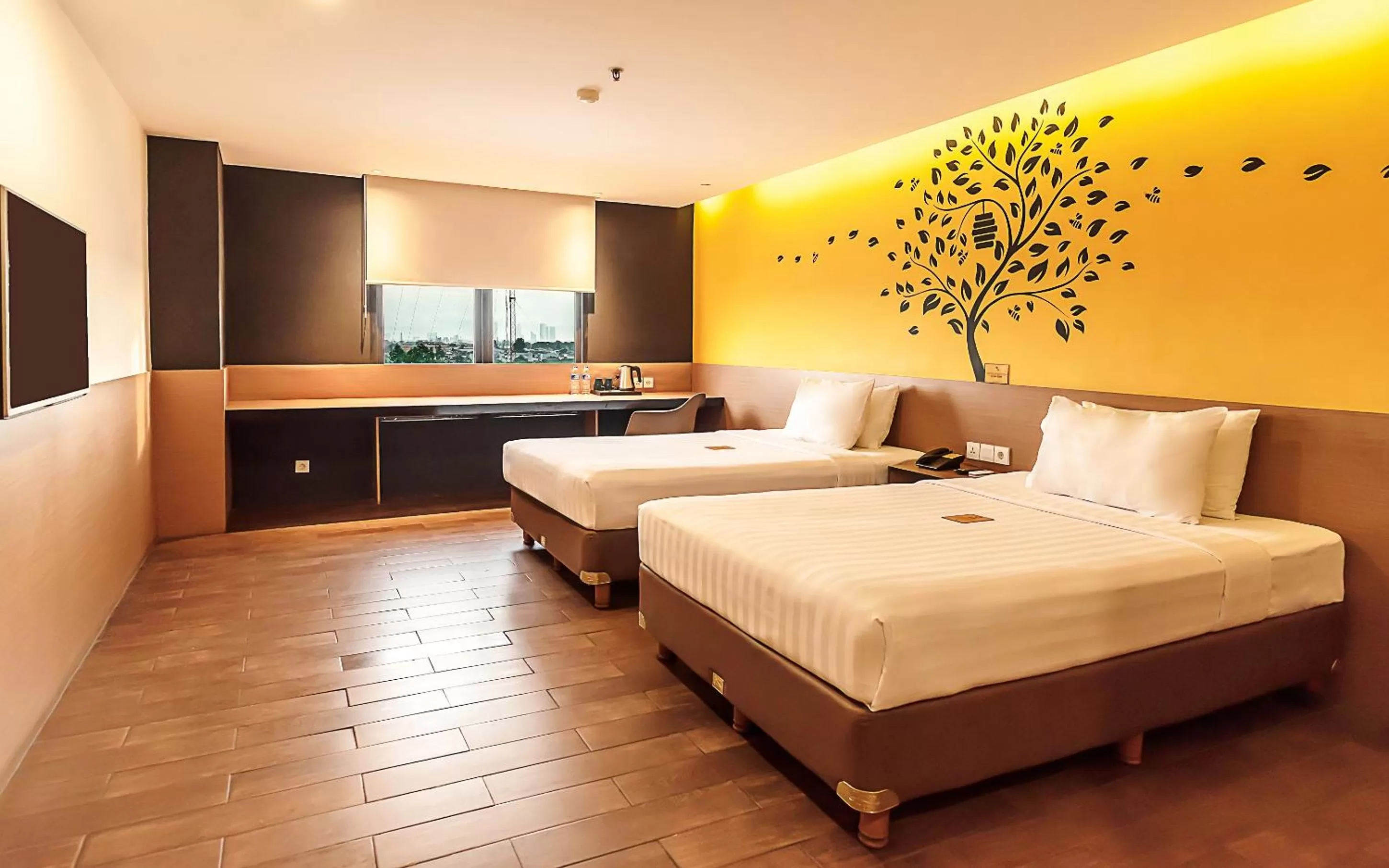 Deluxe Twin Room with Two Double Beds in Yellow Bee Tangerang