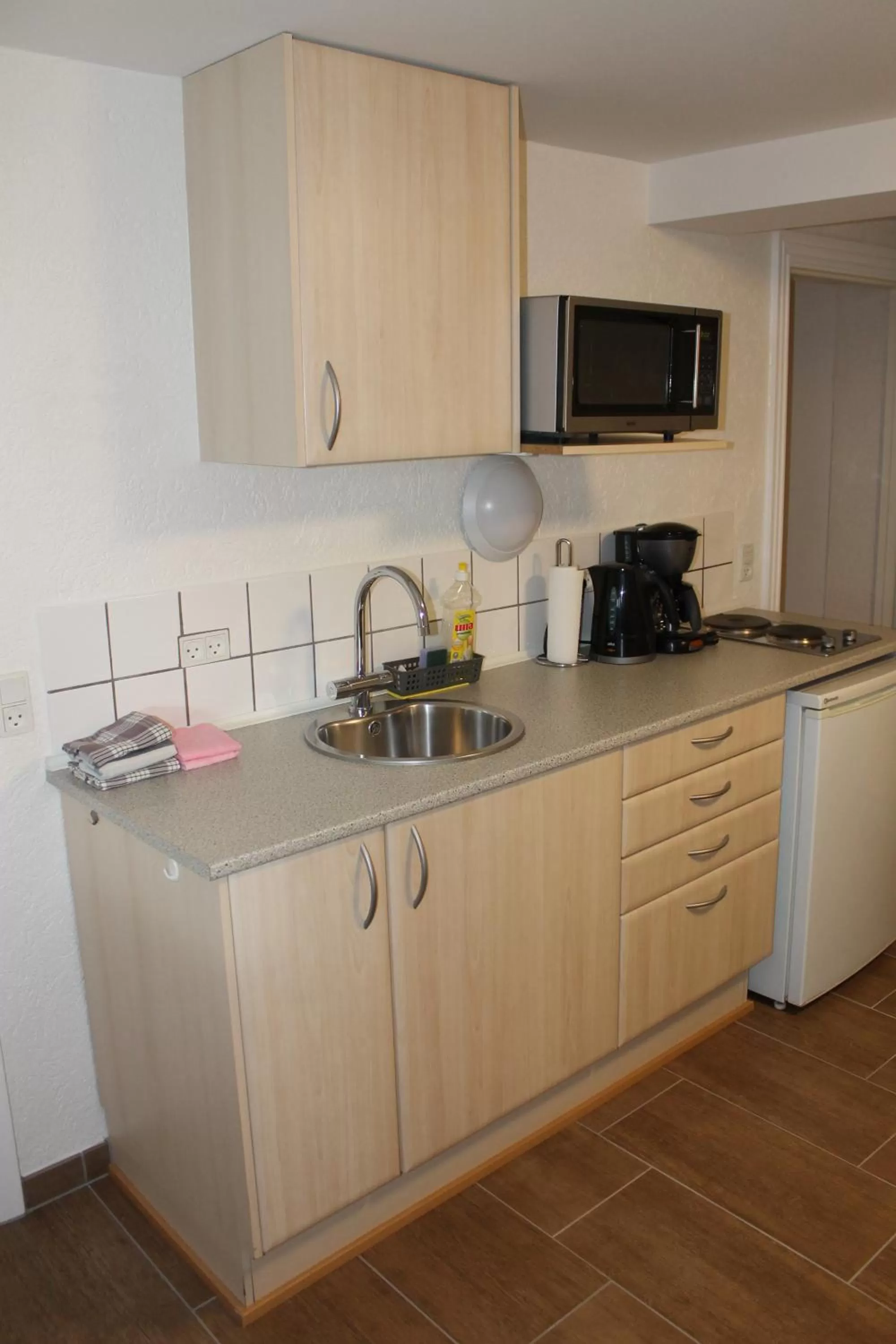 Kitchen or kitchenette in Amalie Bed and Breakfast & Apartments