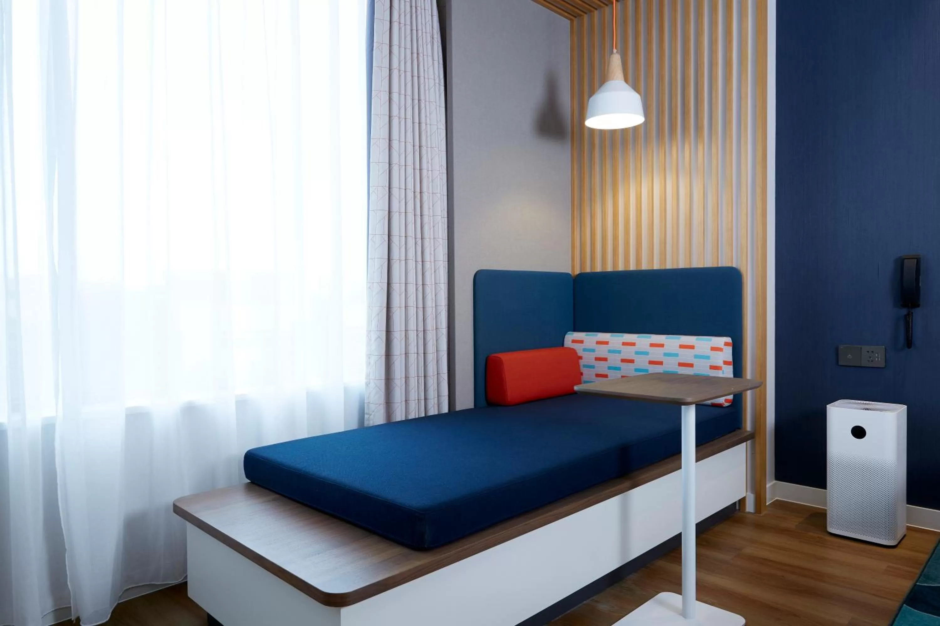 Seating area, Bed in Holiday Inn Express Shanghai Kangqiao by IHG