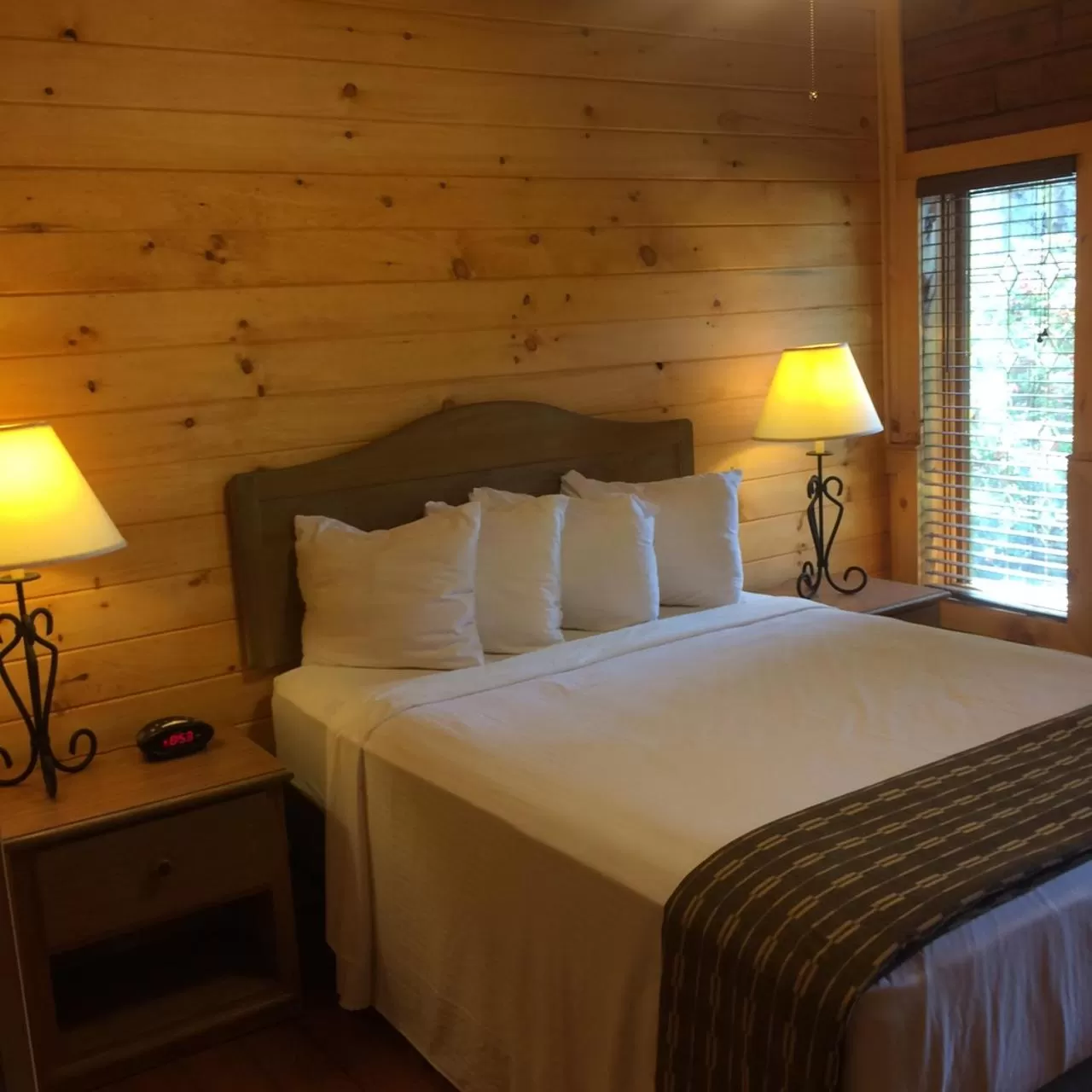 Bed in The Smoke House Lodge