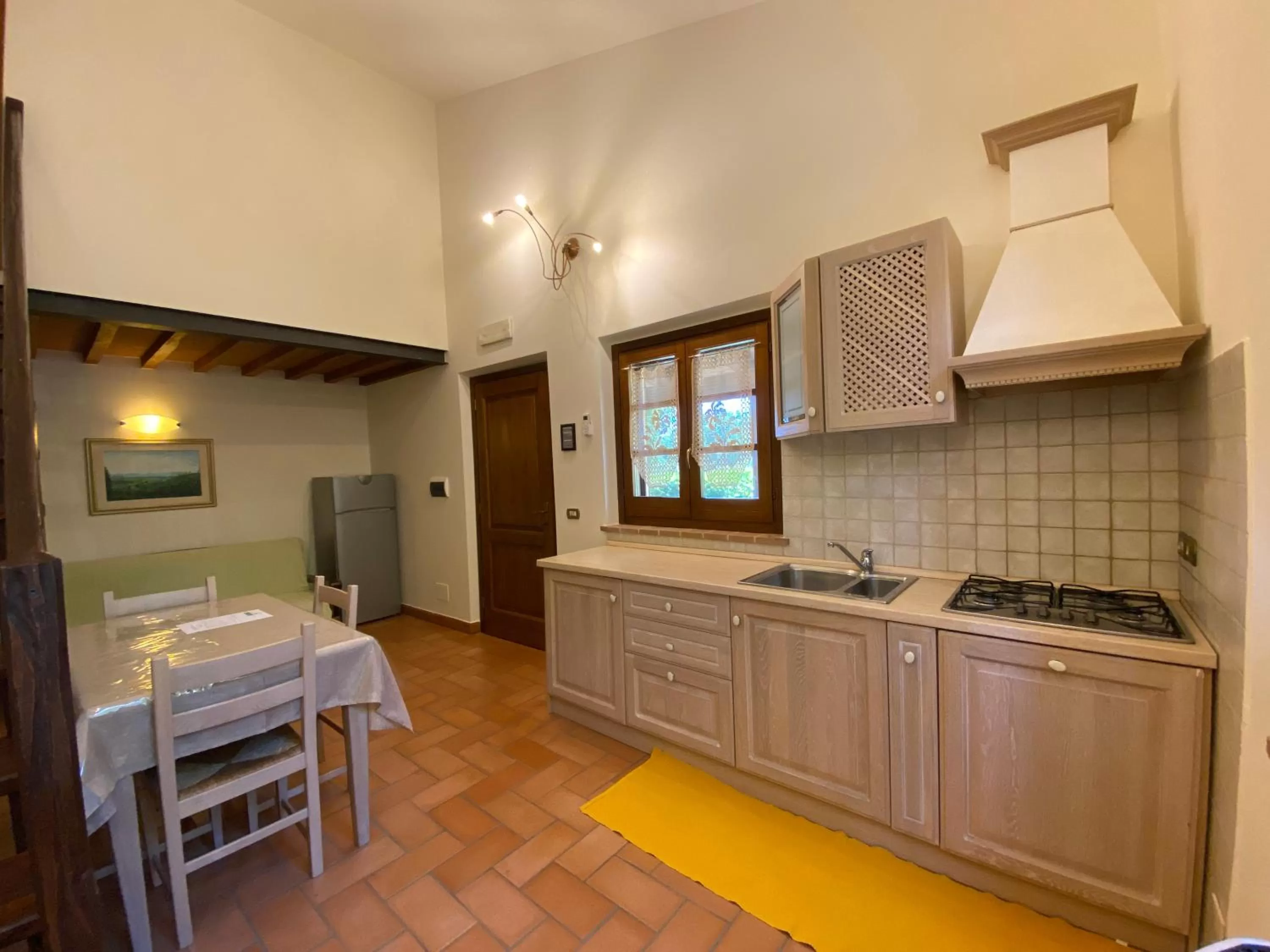 Kitchen or kitchenette in Agriturismo Tenuta Badia