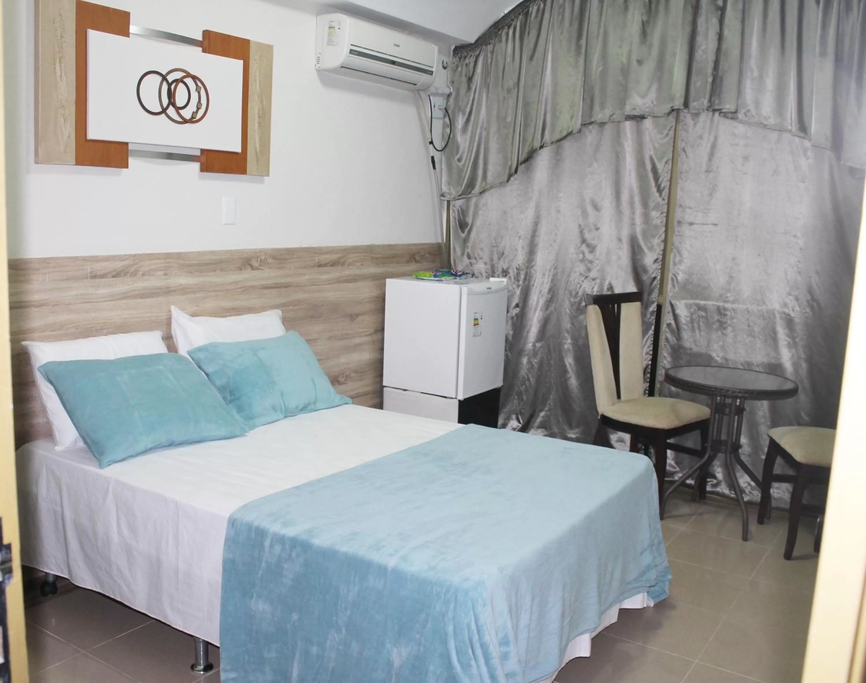 Bed in Pousada Das Palmeiras