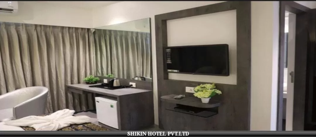 TV/Entertainment Center in Shikin Hotels (Close to Palm Beach Road)