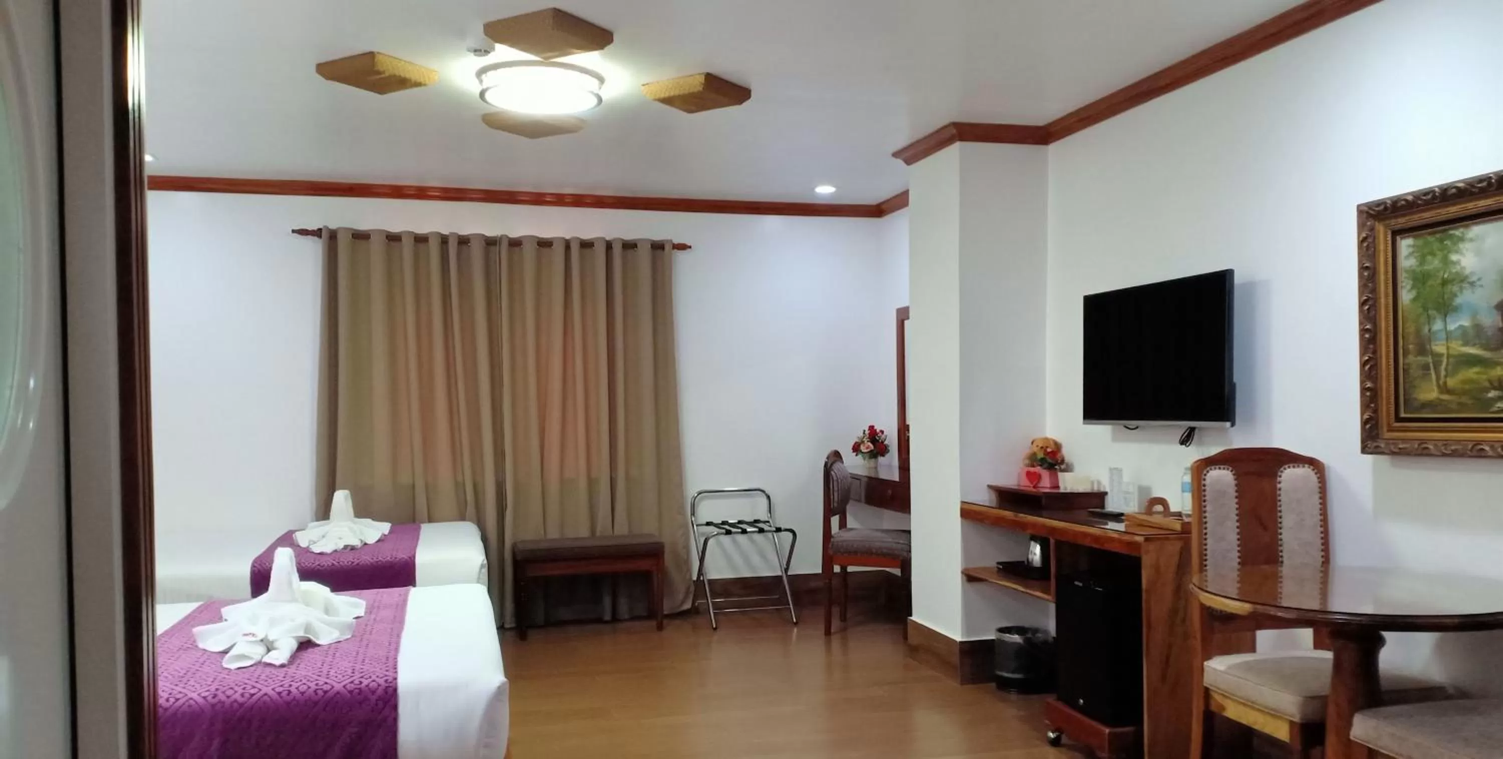 TV and multimedia, TV/Entertainment Center in CLN Boutique Hotel