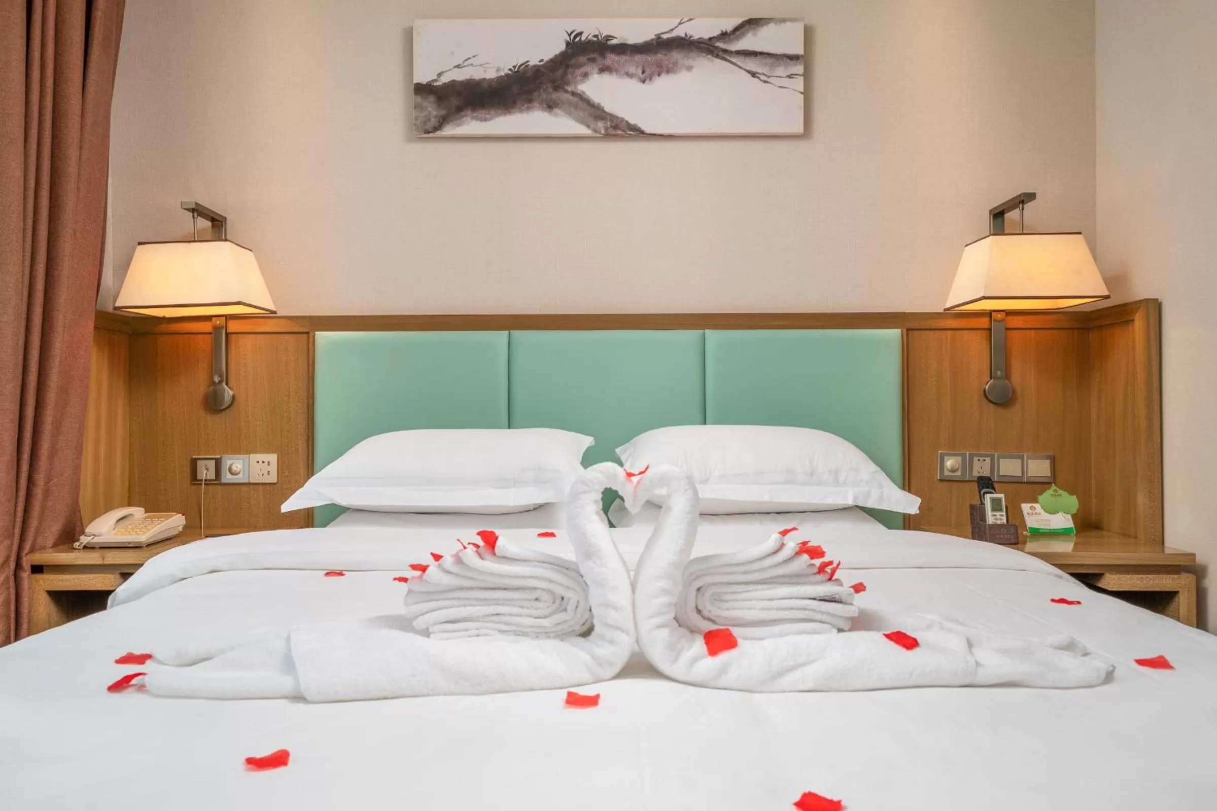 Bed in Guangzhou Boyi Hotel