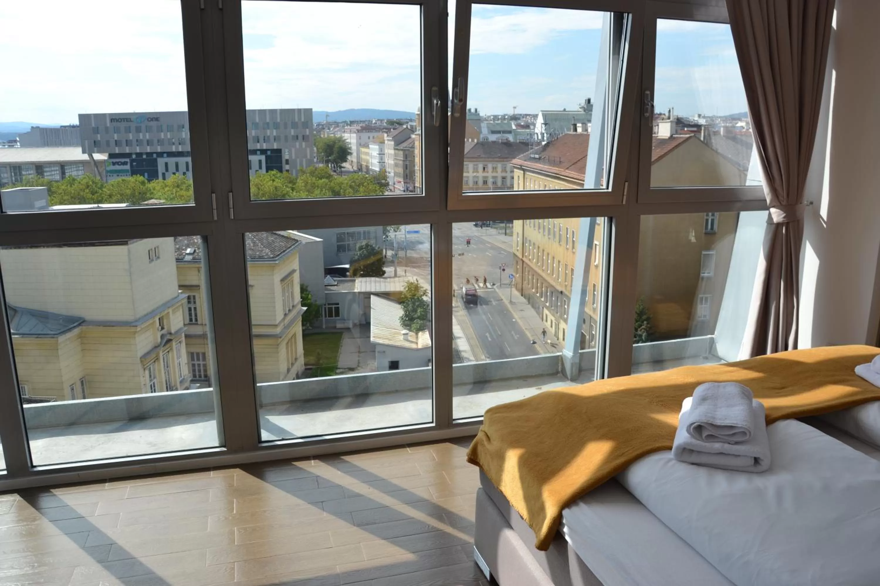 View (from property/room), Bed in Apollo Hotel Vienna