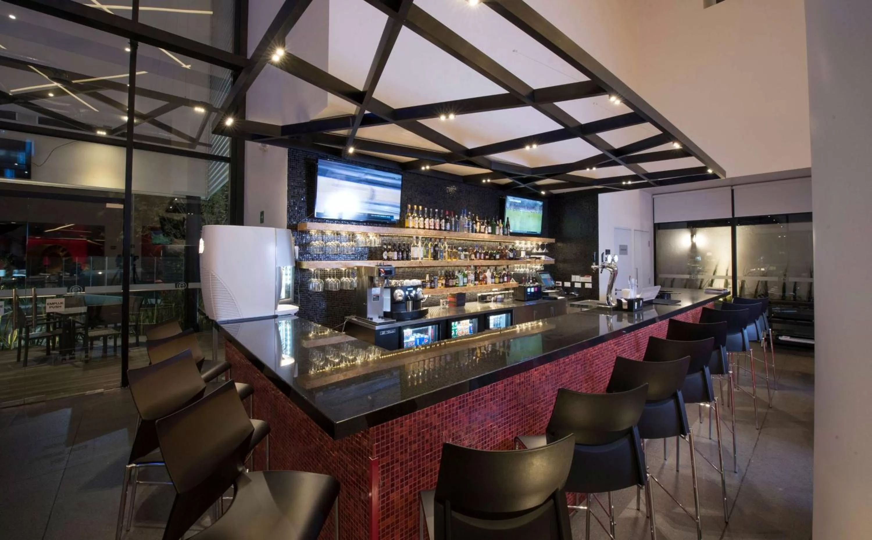 Lounge or bar in Ramada Encore by Wyndham San Luis Potosi