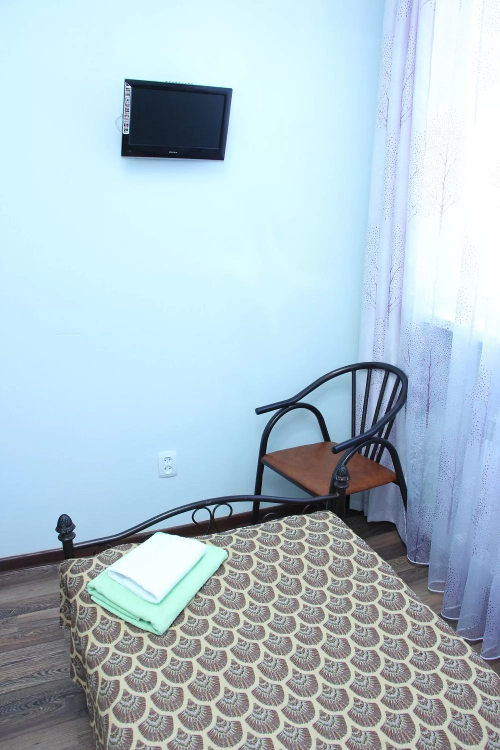 TV/Entertainment Center in Zhaylau Hotel