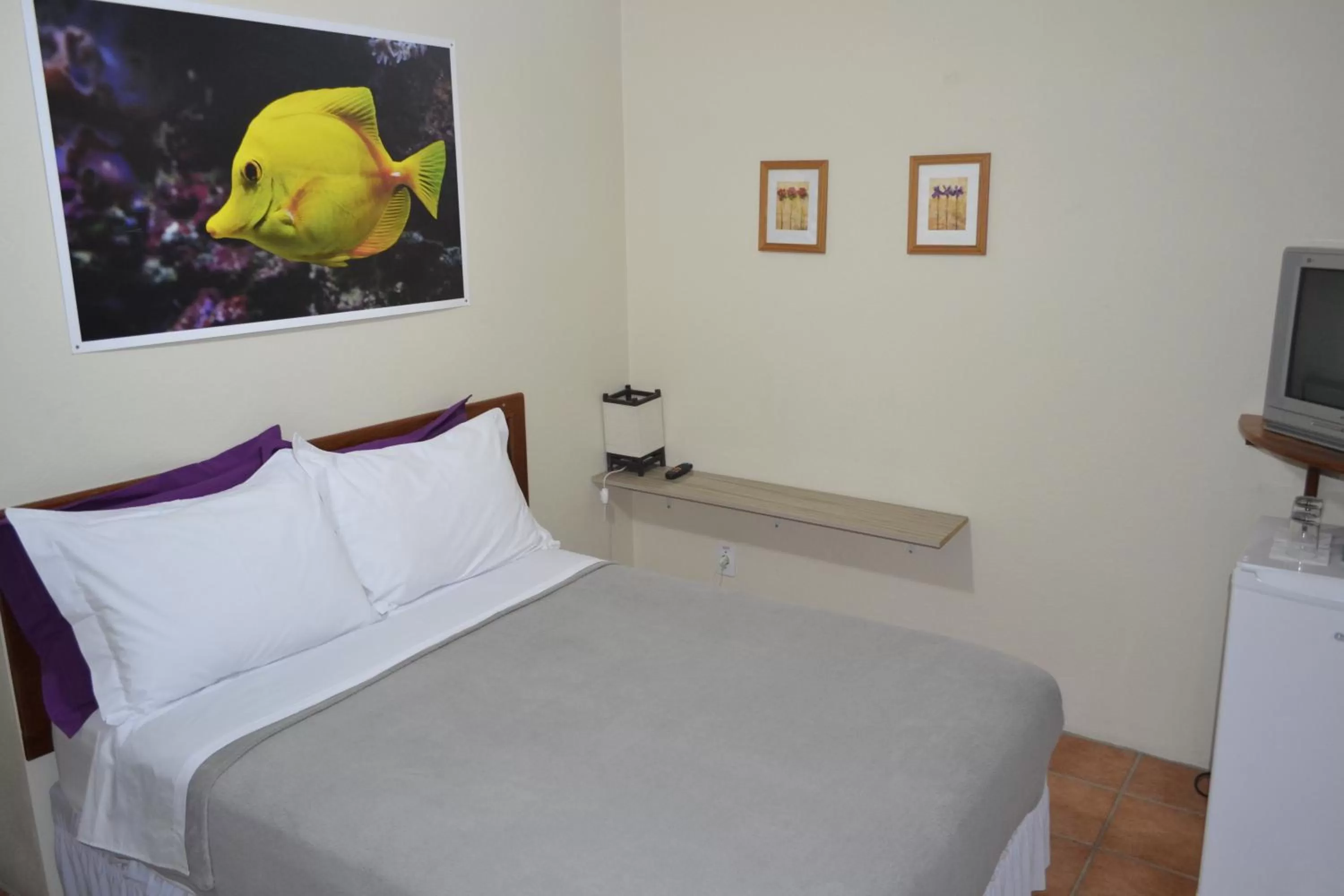 Bed in Pousada Água da Fonte