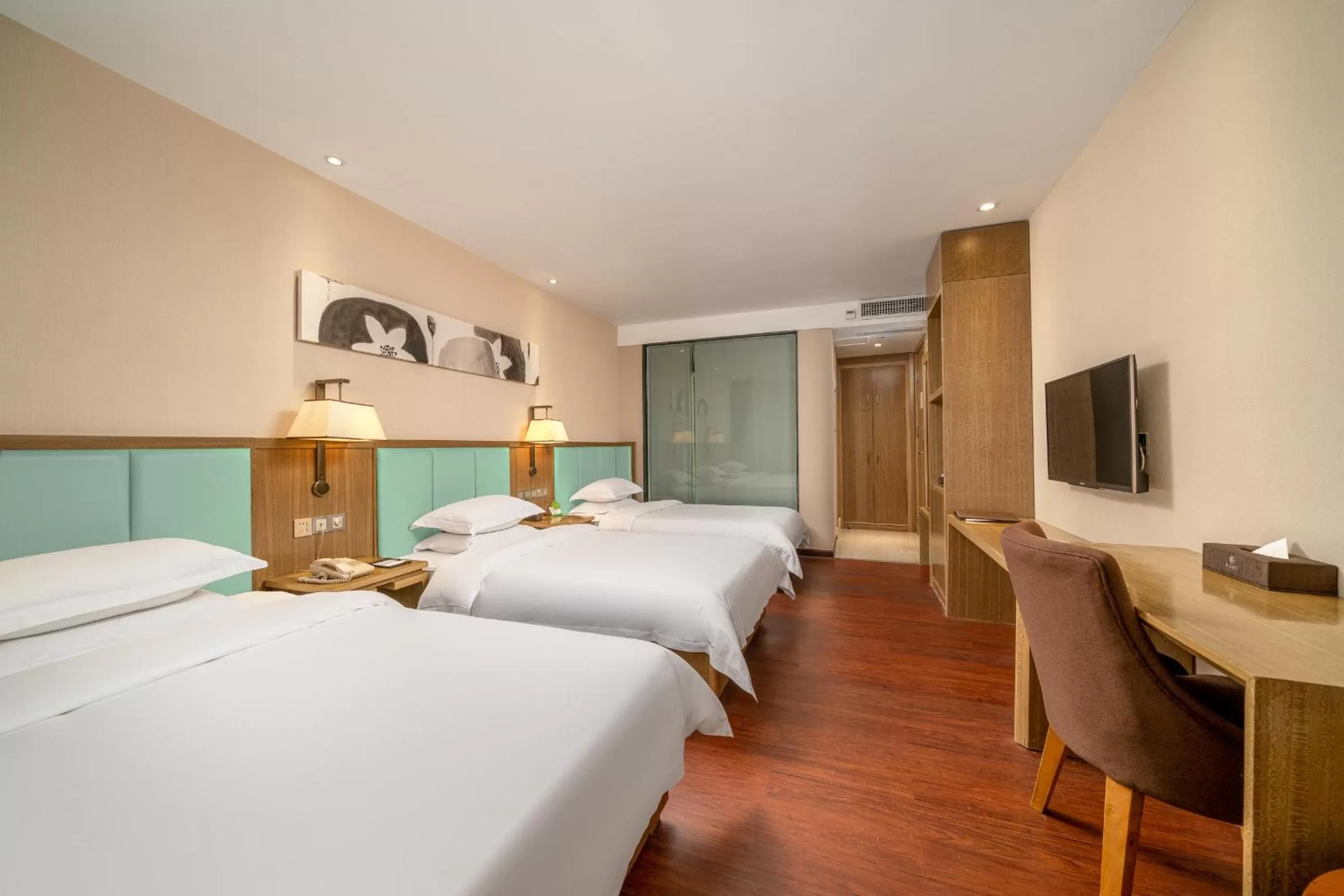 Bed in Guangzhou Boyi Hotel