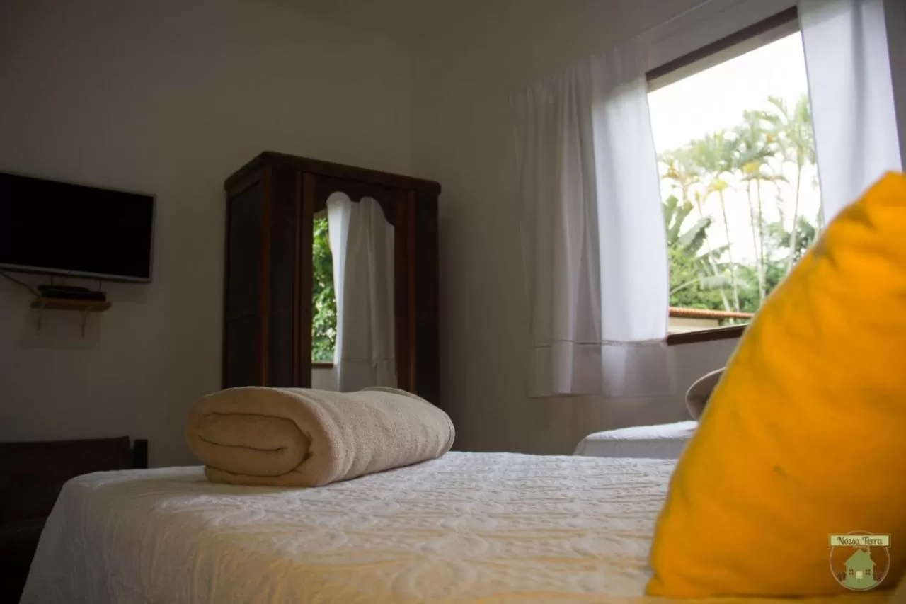 Bed in Pousada Nossa Terra