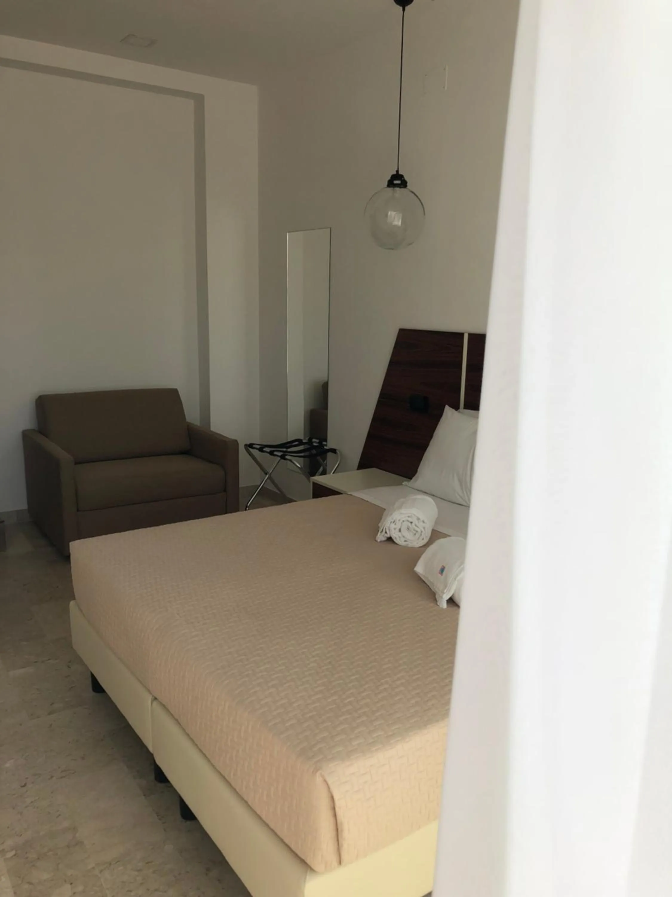 Bed in Albergo Milazzo Inn AiMori