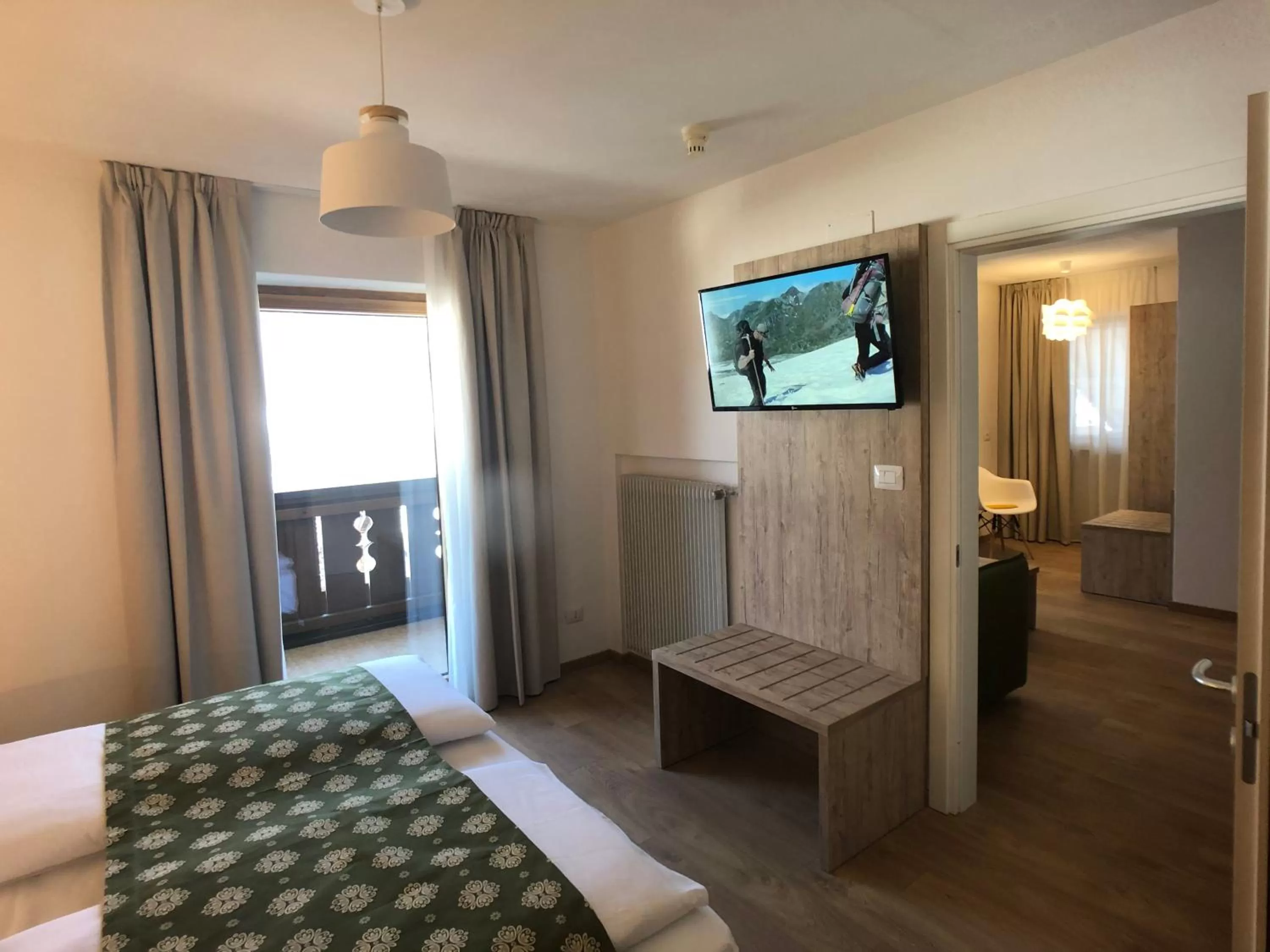 Bed in Hotel Kronplatzer Hof