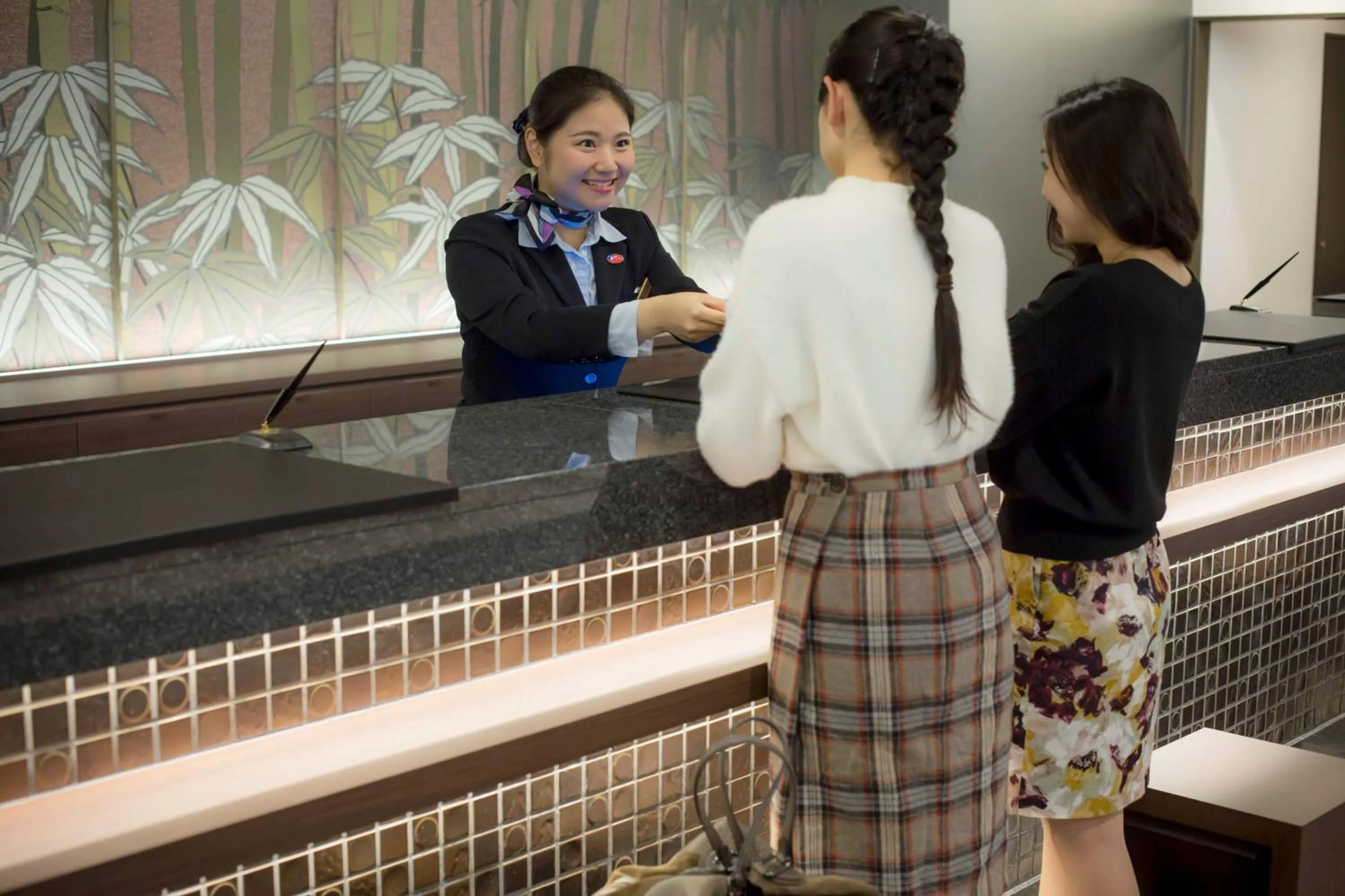 Staff in Hot Spring Osaka Hinode Hotel Nipponbashi