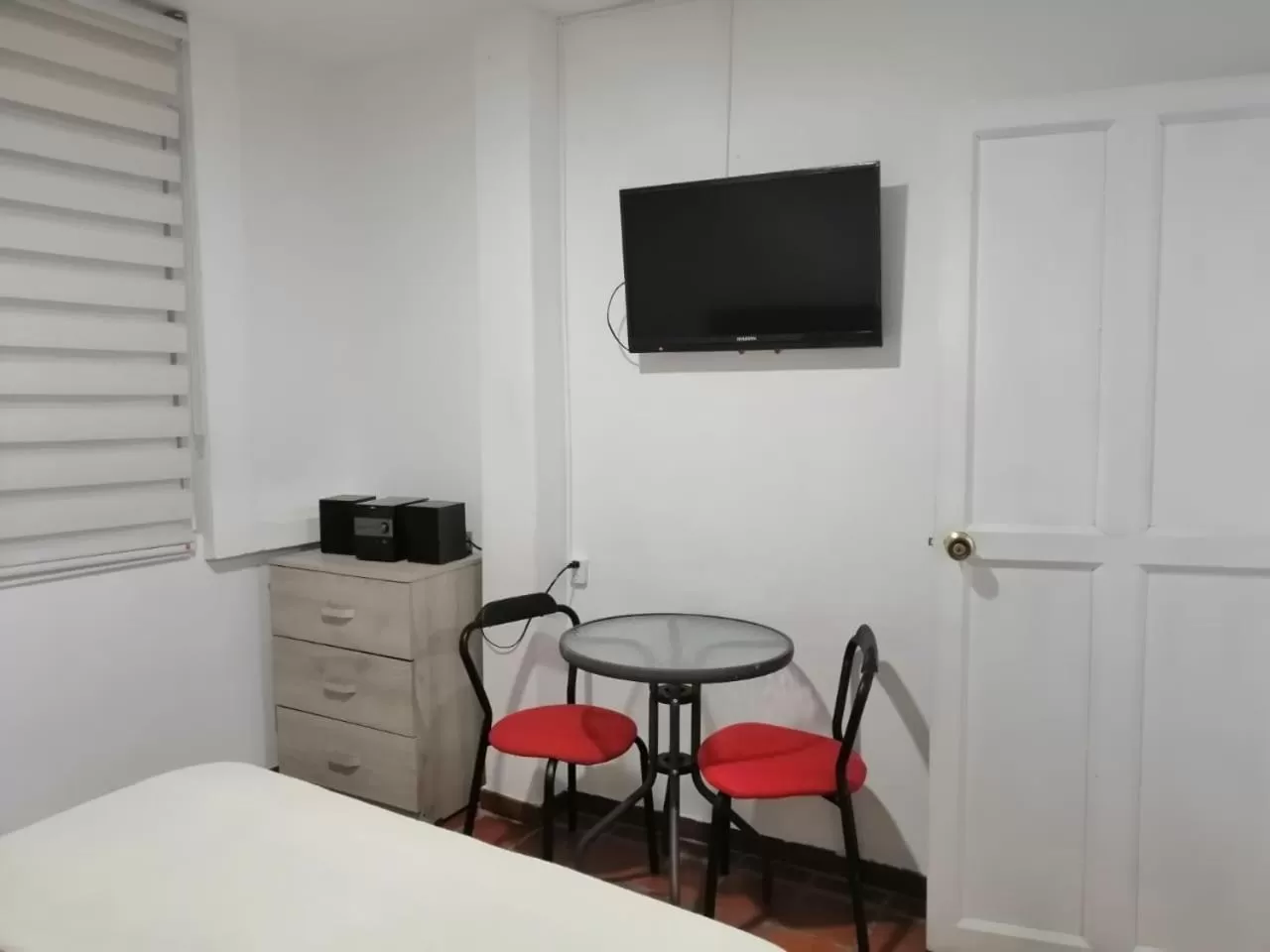 TV/Entertainment Center in Hotel 42 Avenida