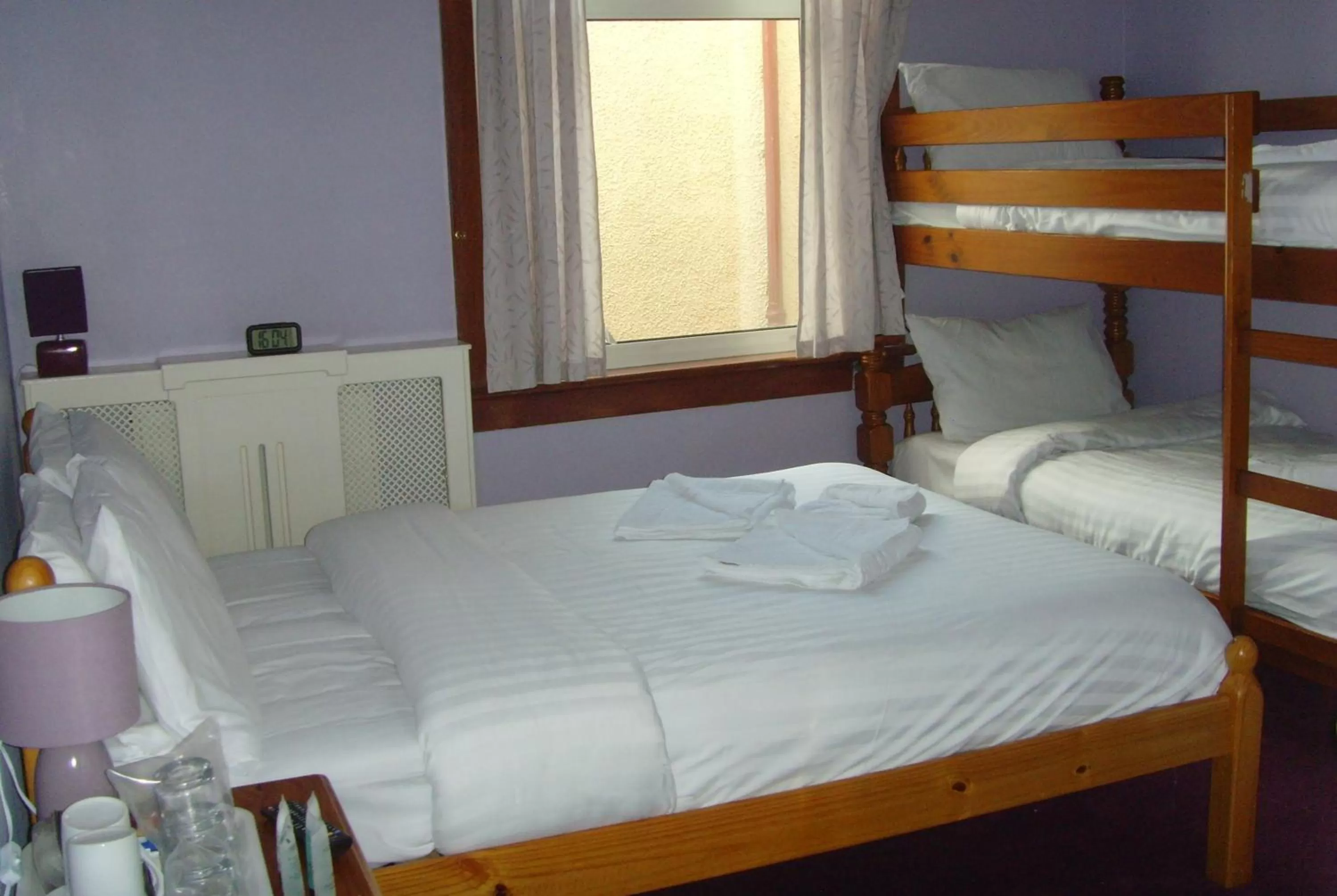 Bed in Twin Lions Hotel