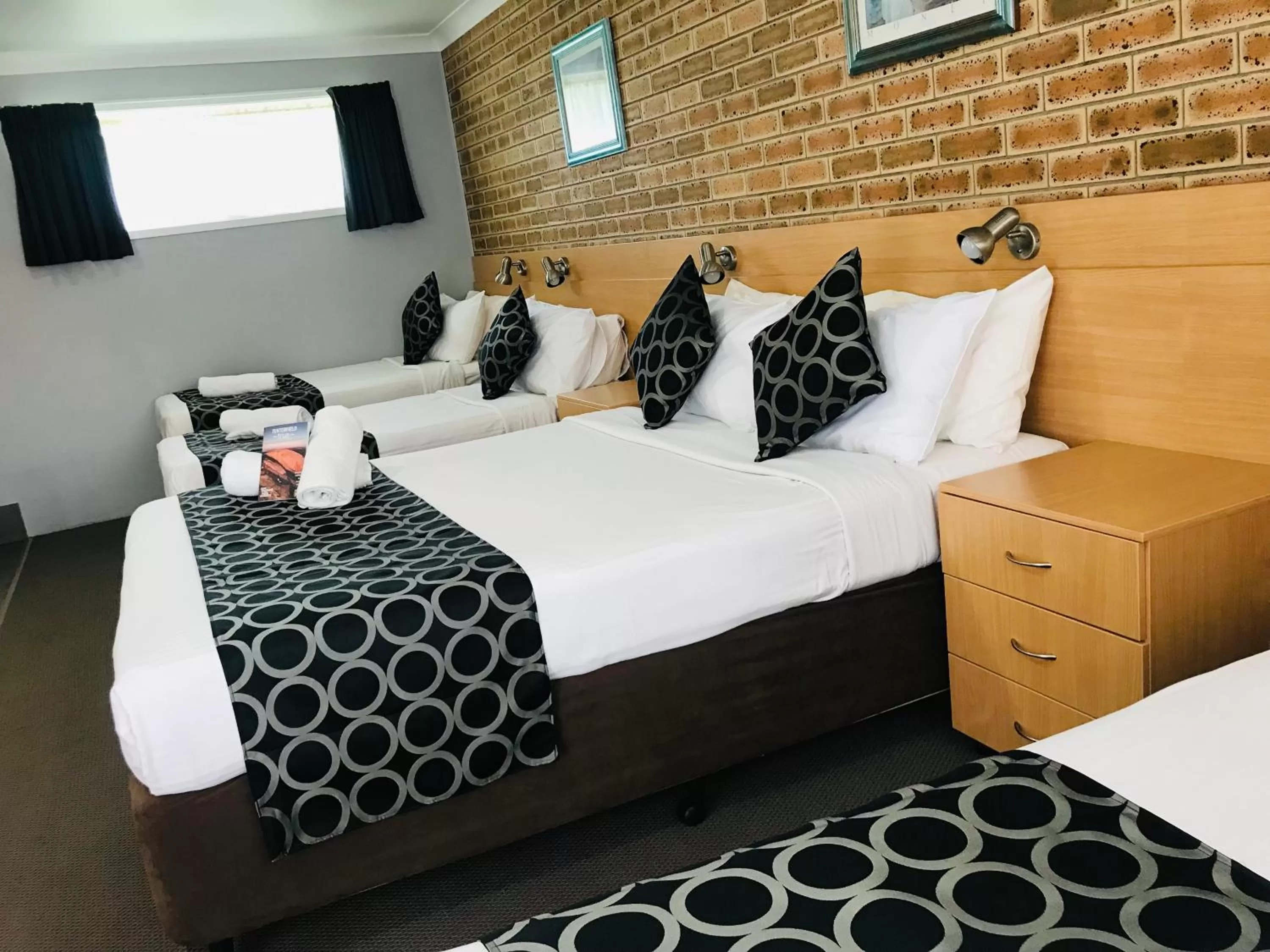 Bed in Jumbuck Motor Inn