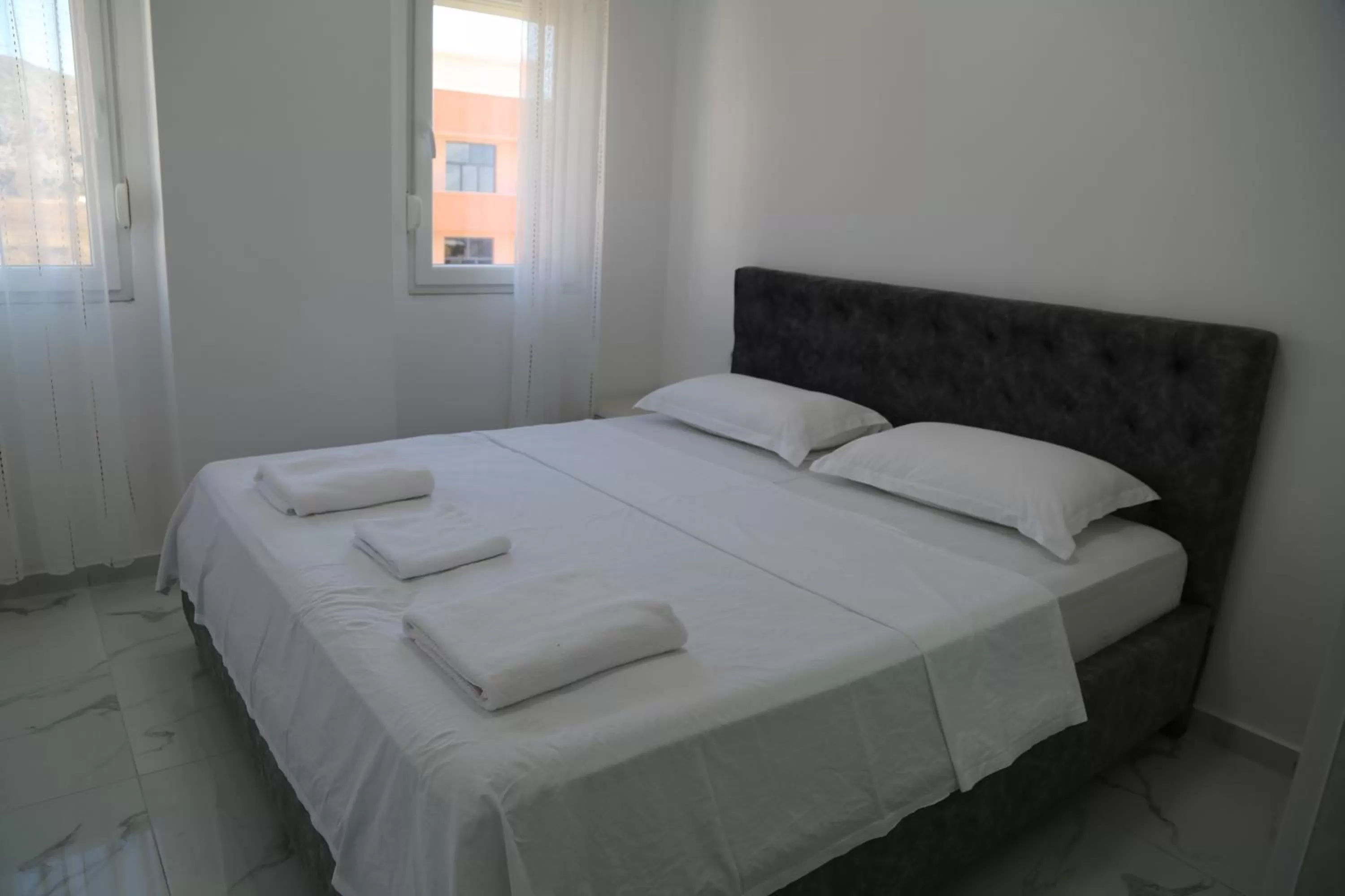 Bed in Anchor Apartments