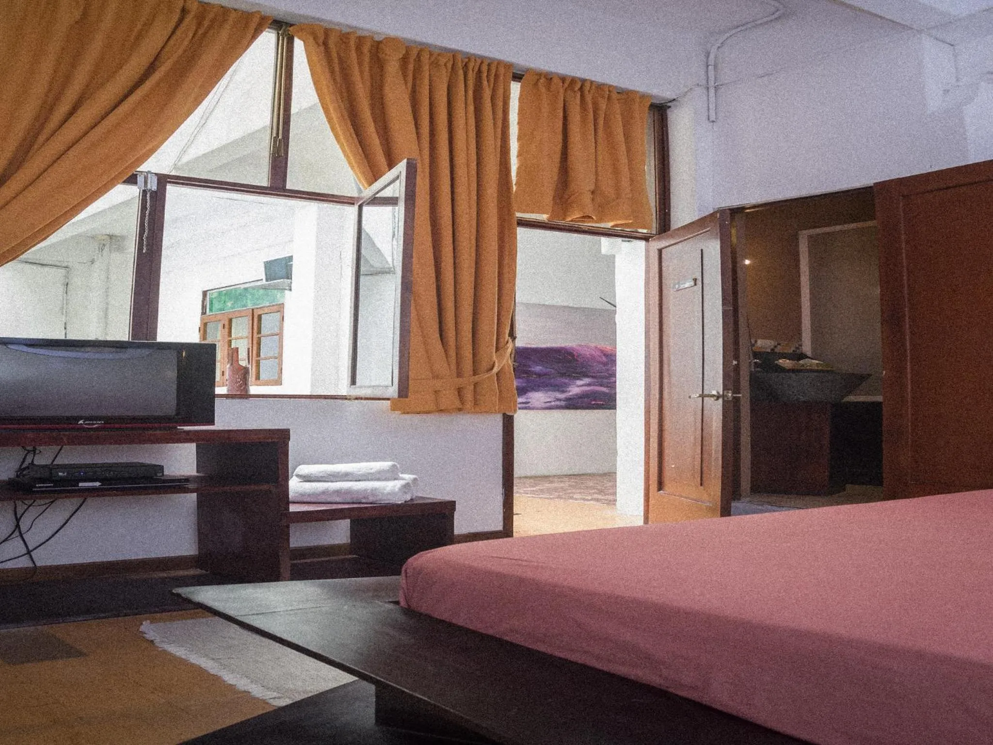 Photo of the whole room, TV/Entertainment Center in Manso Boutique Guest House