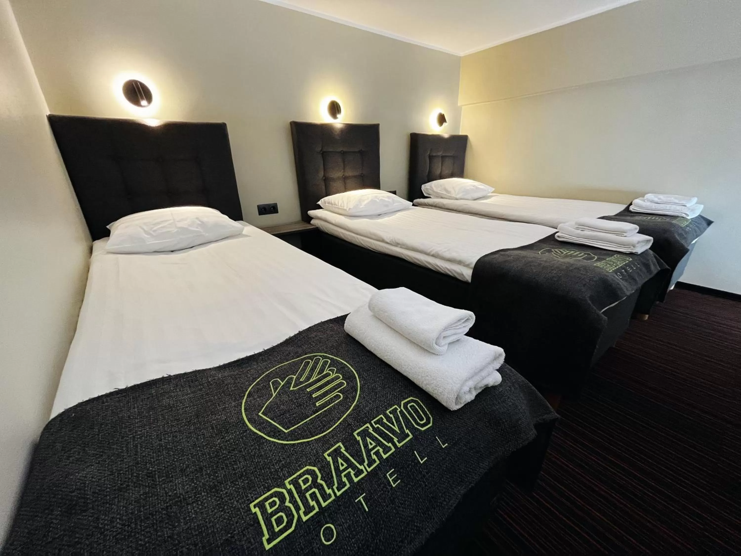 Bed in Braavo Spa Hotel